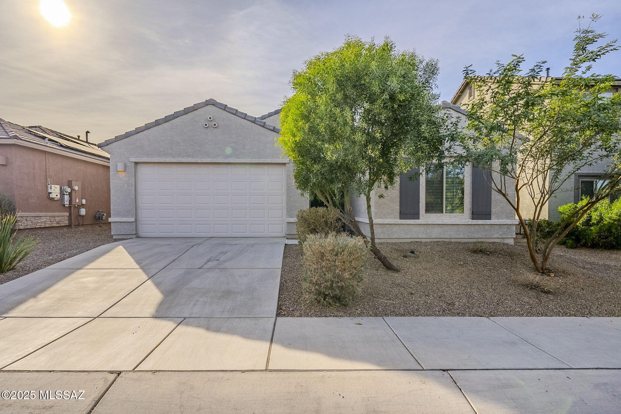 Check the comps--what a deal!  Why wait for new, when you can have better than new? This jewel of a home is not to be missed. No lot premiums. 
No waiting for new construction to be completed. Freshly painted and featuring brand new carpet, this move-in ready home boasts a versatile floorplan, tasteful neutral tile and plenty of natural light.  Bright kitchen has handy island with breakfast bar, electric range, generous pantry and rich cabinets.  Owner's Suite has a large closet and a bathroom with dual sinks. Welcoming backyard has covered patio and is fully enclosed. The sought-after community of Gladden Farms features walking trails, multiple parks and playgrounds, outdoor exercise equipment, dog park, splash pad and soccer fields.  Convenient location with easy access to I-10.