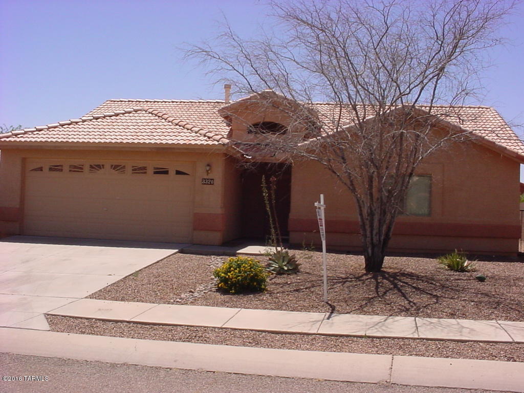 Remarkable Tucson Mountain Sanctuary home in wonderful condition. Open great room concept with soaring ceilings. Large dining area and kitchen features pantry, white appliances and refrigerator with icemaker. Large master bedroom has adjacent master bath with dual sinks. Separate roman-style tub/shower combo and toilet in their own room. Walk-in closet too. Two additional bedrooms and a large guest bath with tub/shower combo. Large backyard features oversized covered patio and lovely shade tree.