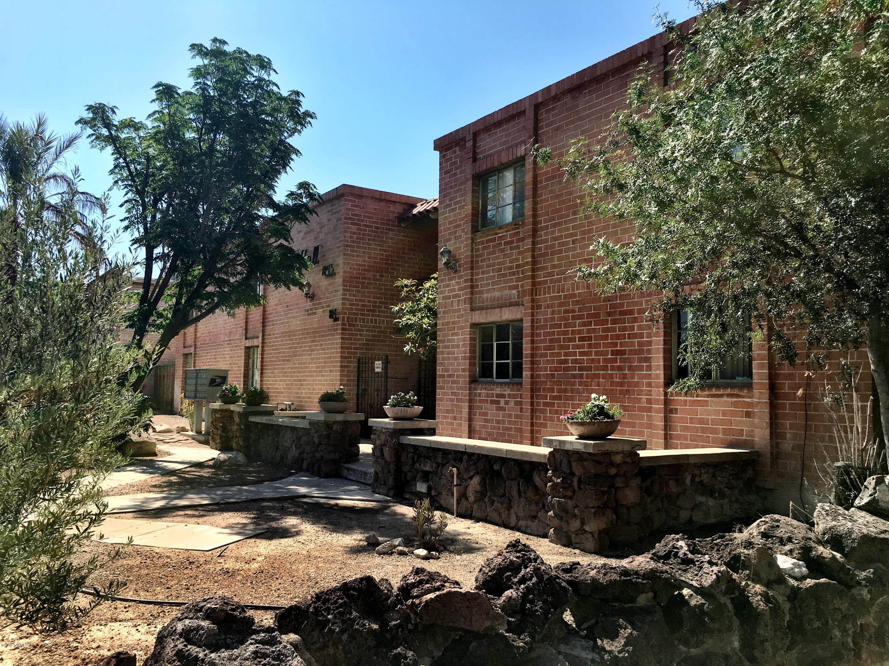The Mark Hall Apartments, 29 brick units only 3 blocks from the University of Arizona. Apartment complexes in this area rarely come on the market. Well built UNDER RENTED (by approximately 20%-30%) property in prime location between downtown and the U of A. Only 4 blocks to 4th Ave. shops and restaurants. 24- 850-950 sq. ft. 2 bd. units, 2-studios , 2- 1 bd, and 1 -1075 sq. ft. 3 bd/2ba. 4 -2 bd. units and 1 -3bd/2ba have been totally remodeled with high-end materials. Community pool & owned laundry,  Units are individually metered for gas & elec. Property is master metered for water and has two central hot water boilers. Gross income is based on current rents. Expenses are performa based on actual 2014 expenses. Longtime owner does majority of maintenance.repairs and management.