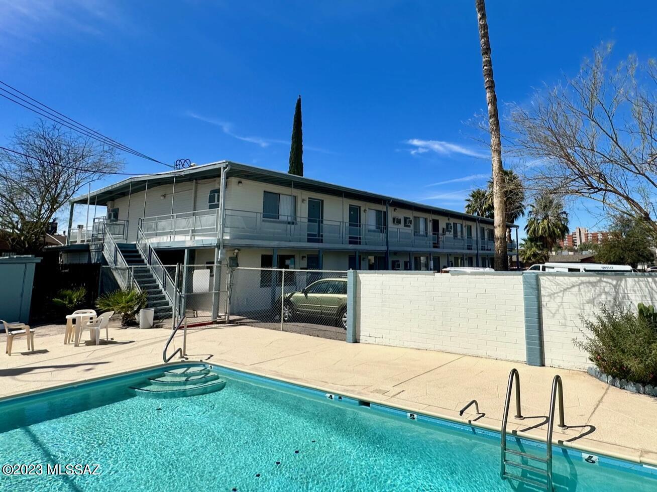 Located just two city blocks south of the University of Arizona, this 20 unit apartment complex features paved parking, on-site laundry, and a pool. Each studio offers a full bathroom with neutral Tub/Shower, spacious closet, and wall heating and a/c. Well maintained grounds and walking distance to the university campus, restaurants, and athletic facilities.
