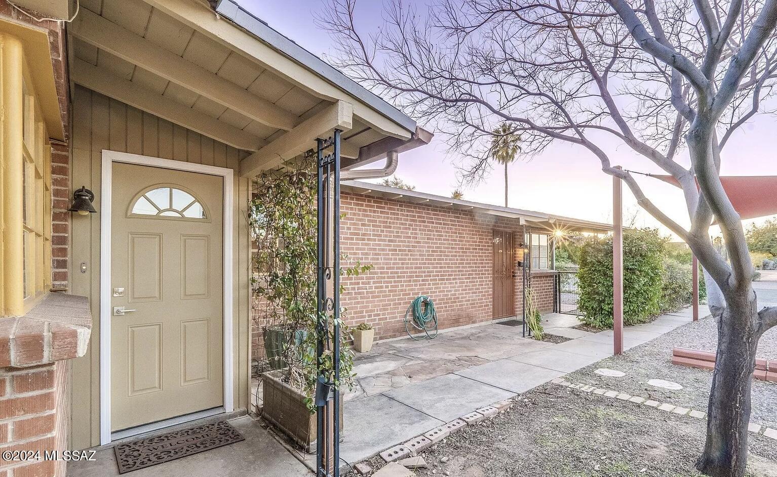 Discover a prime opportunity in the heart of Tucson with this stylish midtown duplex at 1002 N Jones Blvd. This property offers 1,704 sqft of living space, divided into two charming units with 2 bedrooms and 1 bathroom each. Both units feature modern updates, including wood plank tile flooring, renovated kitchens, and refreshed bathrooms. Outside, enjoy private patios surrounded by eye-catching metalwork.

The property's vibrant location is close to amenities, including Whole Foods Market, premier restaurants, and shops. Himmel Park provides green spaces for recreation, while nearby schools like Coyote Music Together and AGAVE Middle & High School cater to families. Commuters will appreciate access to the SL/Helen/Warren light rail station and Country Club/Speedway bus station for easy travel around Tucson.

This duplex presents a comfortable home and an attractive investment opportunity, offering potential rental income from one or both units in this high-demand area. Enjoy updated finishes, indoor laundry in each unit, and a perfect blend of urban accessibility with the tranquility of home.