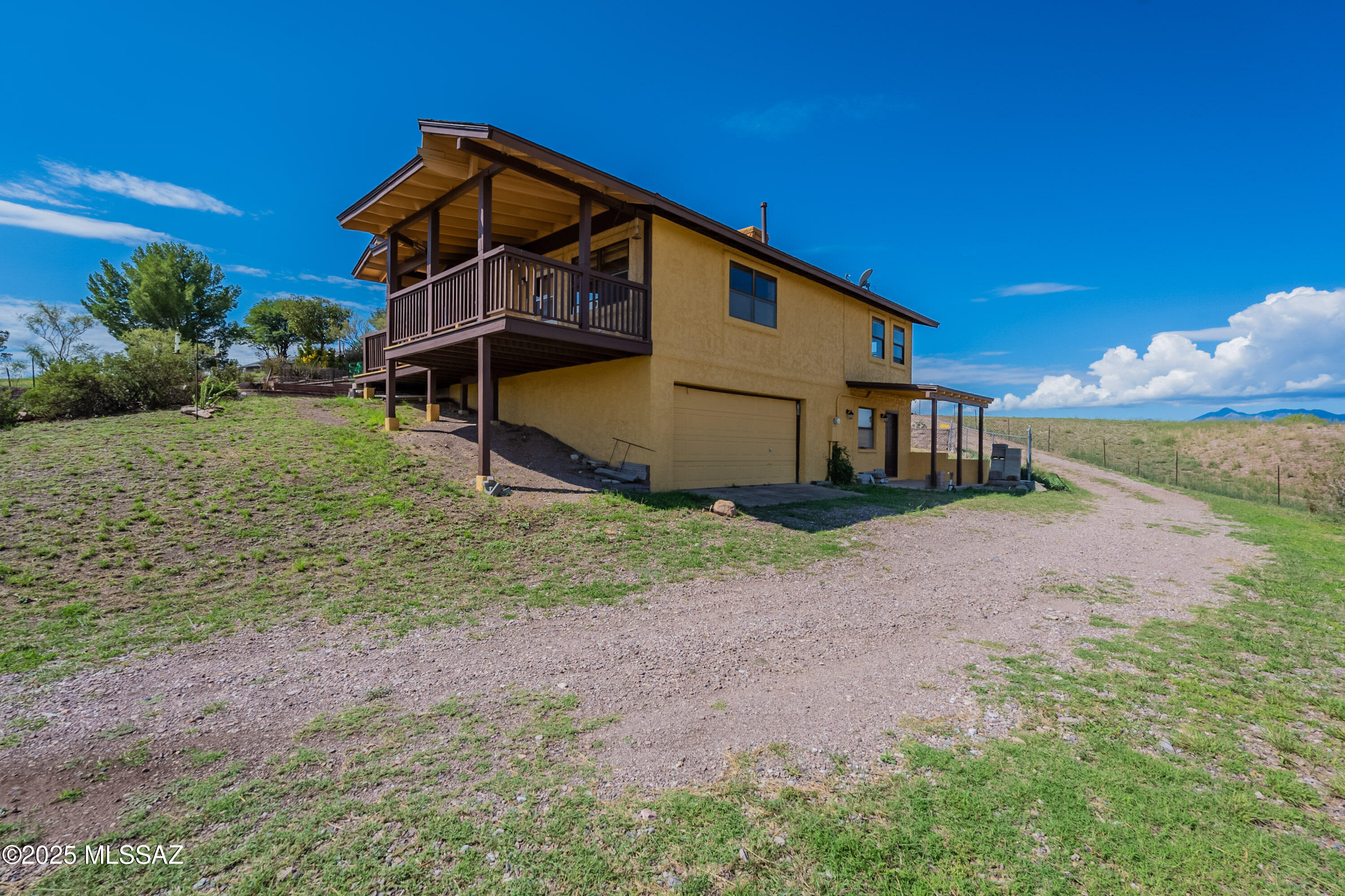 Welcome to 8 Chula Court-Your slice of Sonoita Paradise! Nestled on nearly three acres of serene Arizona countryside, this charming
home offers the perfect balance of comfort, space, and potential. Step inside and you'll find a warm and inviting layout featuring 2
bedrooms and 2 and a half baths, along with a spacious great room and a downstairs Bonus room. But the real magic is outside. Imagine waking up every morning to breath taking mountain views and endless skies, the property is fully fenced and making it ideal for horses.Gardening or simply enjoying the the wide open spaces. Located in the heart of Arizona's wine country, this home puts you minutes from
vineyards, trails, and the charm of Sonoita's small town lifestyle-all while giving you the peace and privacy of country life