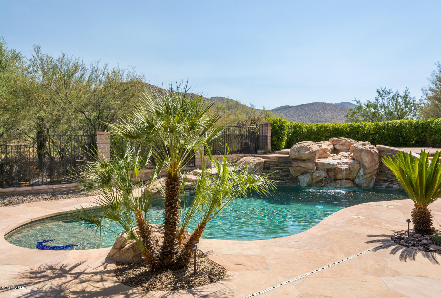 Gated courtyard, w/stacked stone turret entry & double doors welcomes you to this fabulous find in Dos Lagos! Large foyer opens to living room w trio of arched windows w/ amazing pool & mtn views.  Raised hearth fireplace, display niches,  wood mantle.  Well appointed kitchen features 2 bar height counters, island, wine fridge, GE Monogram Appliances w/Blt in wall & micro ovens, 5 burner gas cooktop w stainless vent hood in fridge, skylight, large pantry. Large formal dining w/plenty of light. Double doors lead to your master retreat, w/ room for seating area by windows to take in the view.  Dual closets, soaking tub, huge glass block shower. BR 2 has private bath, BRs 3 &4 share Jack&Jill bath. Two level patio has pool, spa, waterfall, gas fire pit, blt in BBQ w bar & fridge. 2x6 const.
