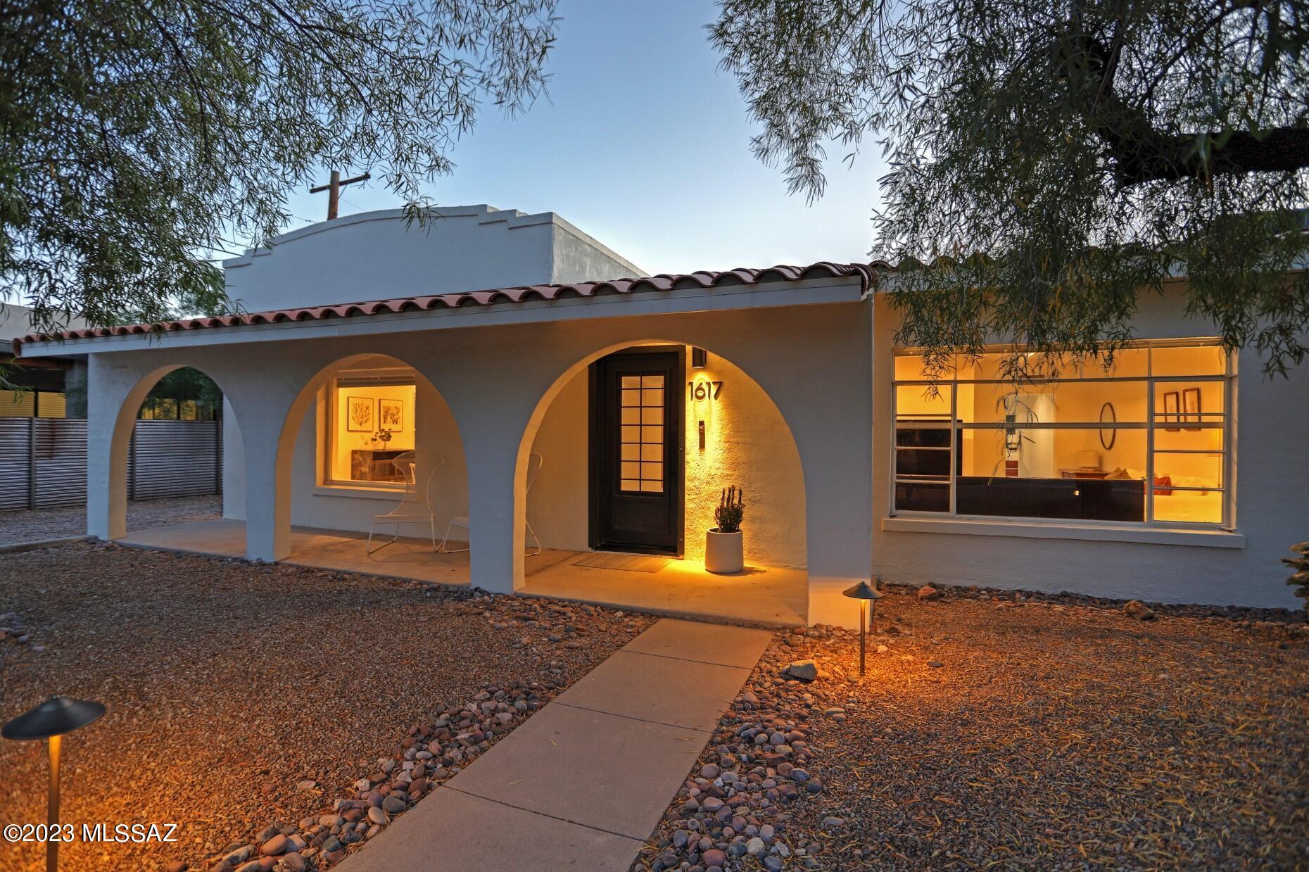 Exceptional 1943 Home Located in Desirable Blenman Elm, Practically Around the Corner from Iconic Arizona Inn.  Completely renovated 2019-2022.  One story, 3 spacious bedrooms/3 baths - 3201 sq ft.  Newer roof (10 yr warranty), complete HVAC + 2 mini-splits, plumbing re-piped to all fixtures & sewer. Updated electric, tankless water heater & water softener system.  Exterior paint & interior including beamed wood ceiling. Concrete flooring thruout. Custom cabinets & hand made tiles in kitchen & baths. Kitchen quartz counters, 6 burner gas cooktop, French door oven, wine cooler and small eat-in area. Designer iron front door, ring door bell, smart thermostat & day/night cellular blinds. Covered patios back & front. yard. New Landscape backyard - Pavers, turf, Oleander natural fence, citrus (meyer lemon, orange & grapefruit). Termite warranty thru 10/23. Located close to the ongoing renaissance of downtown & the barrio - great shopping, restaurants, entertainment & all the University provides. Don't miss this one!
