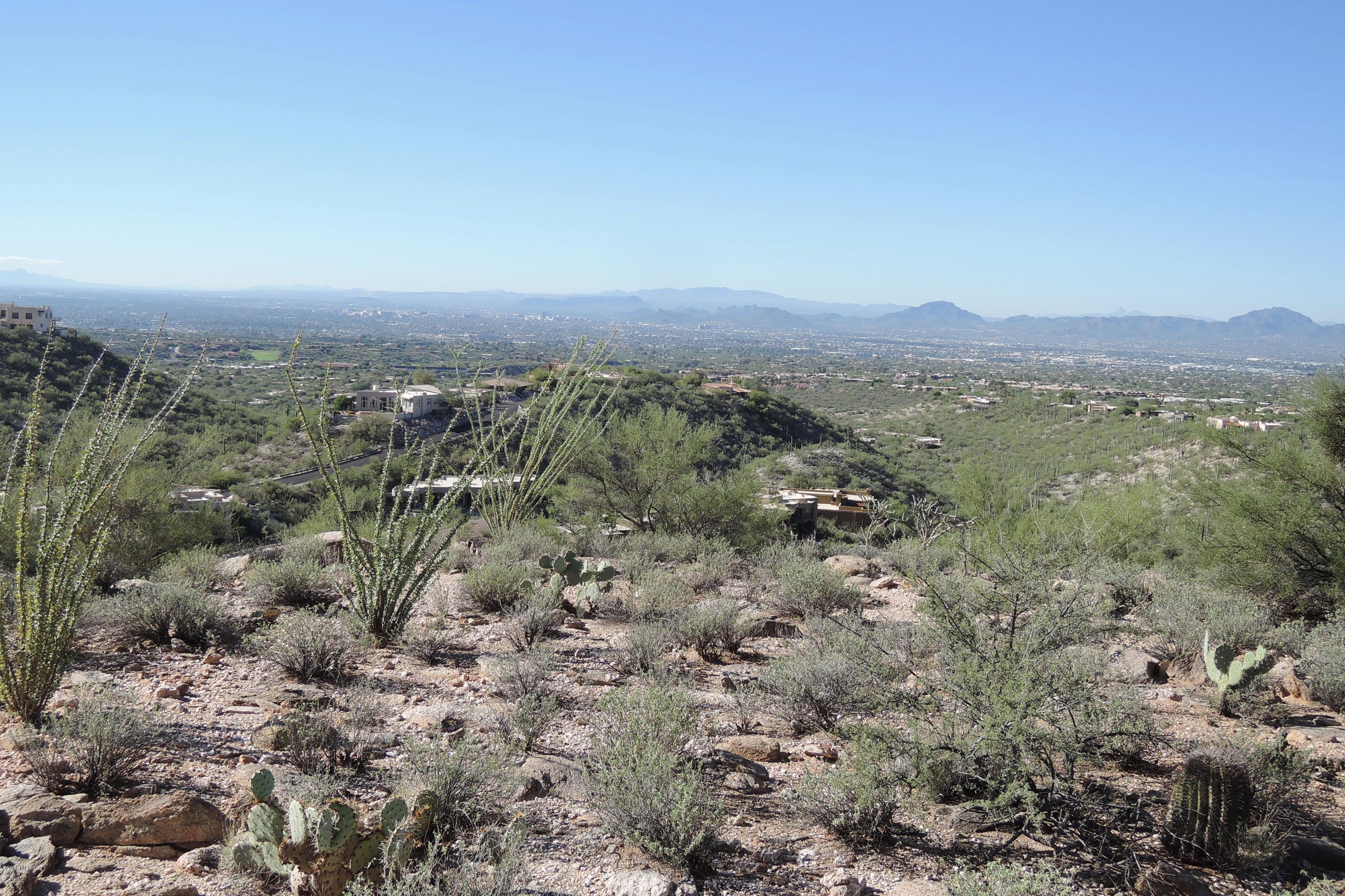Yes, you can have it all! Simply breathtaking views in every direction from this very secluded, exceptionally buildable home site in one of Tucson's most exclusive enclaves of custom homes.