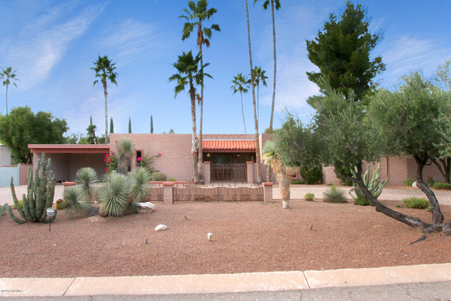 Impressive & inviting at first glance w/driveway pavers, custom landscape & wrought iron accents. Spacious  4BR home on large lot in quiet, desirable Sabino Vista is beautifully remodeled from floors to ceilings.  Kitchen remodel in 2015 with stainless steel appliances, quartz: gorgeous.  Fam rm with built in bar, buffet, custom niches.  Matching entertainment center, surround sound. Fam rm, elegant and separate formal living dining rms, all off oversize entry, w/ interesting, excellent arrangement of space.  Polished concrete, Saltillo; fresh paint.  Generous master suite, fantastic closet/storage.  Back yard  has sparkling pool, great patio areas as plus nice size grassy area, mature landscaping.  Comfortable and gracious, pride of ownership inside and out; immaculate and move in ready