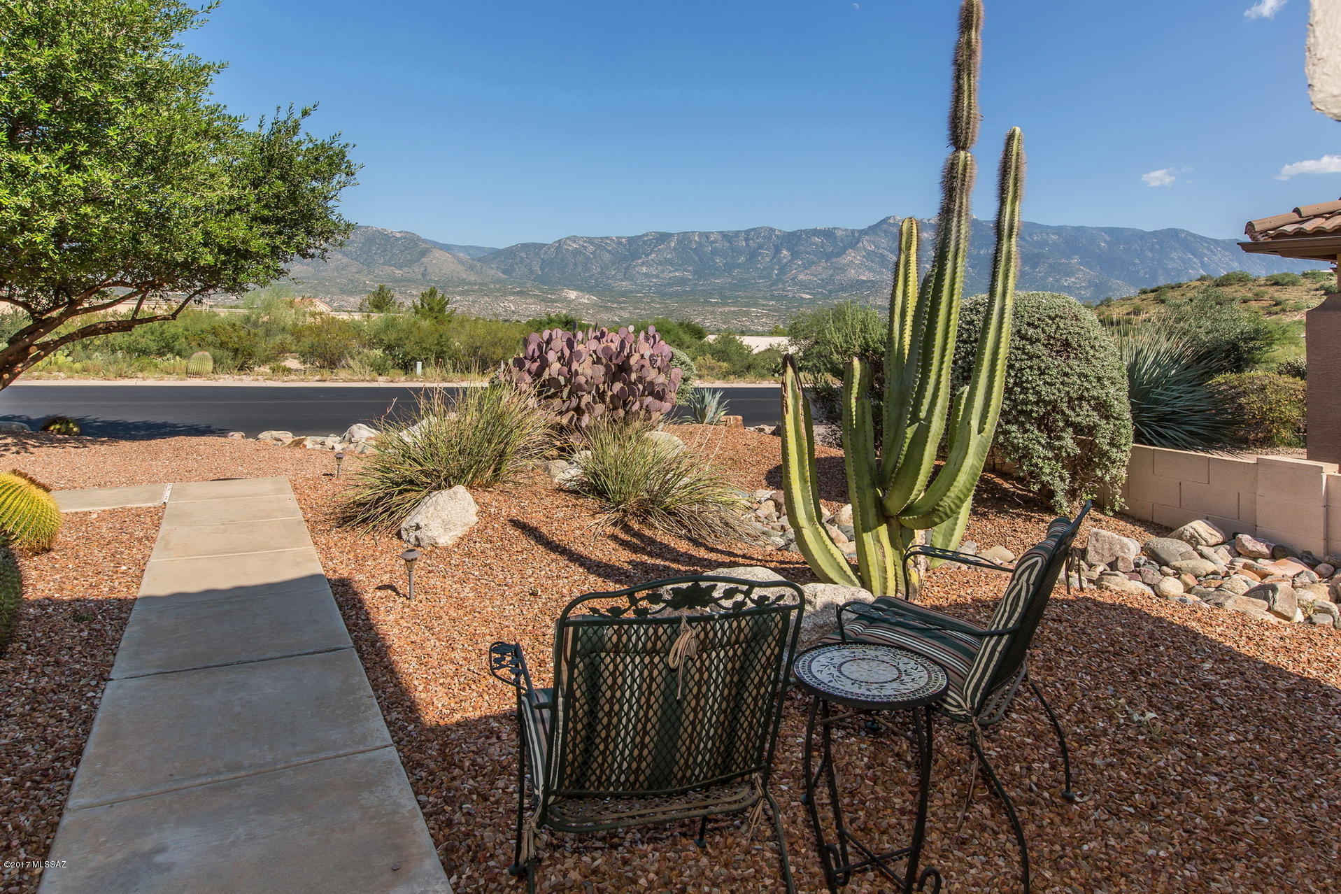 Lowest priced Laredo model in SaddleBrooke! This terrific home is sited on the 12th hole of the Mountain View Golf Course and enjoys a number of coveted features including a large great room, split bedroom plan with 2 bedrooms plus den/office & lovely mountain views from the kitchen/breakfast nook area. The master bedroom opens to the master bath with walk-in shower, dual sinks & large walk-in closet. All appliances convey, including the new hot water heater and newer HVAC system.  Seller also providing Buyers with one year home warranty program. This home is within easy walking distance to the SaddleBrooke commercial center and is move in ready. Just bring your personal touches and make it your own!