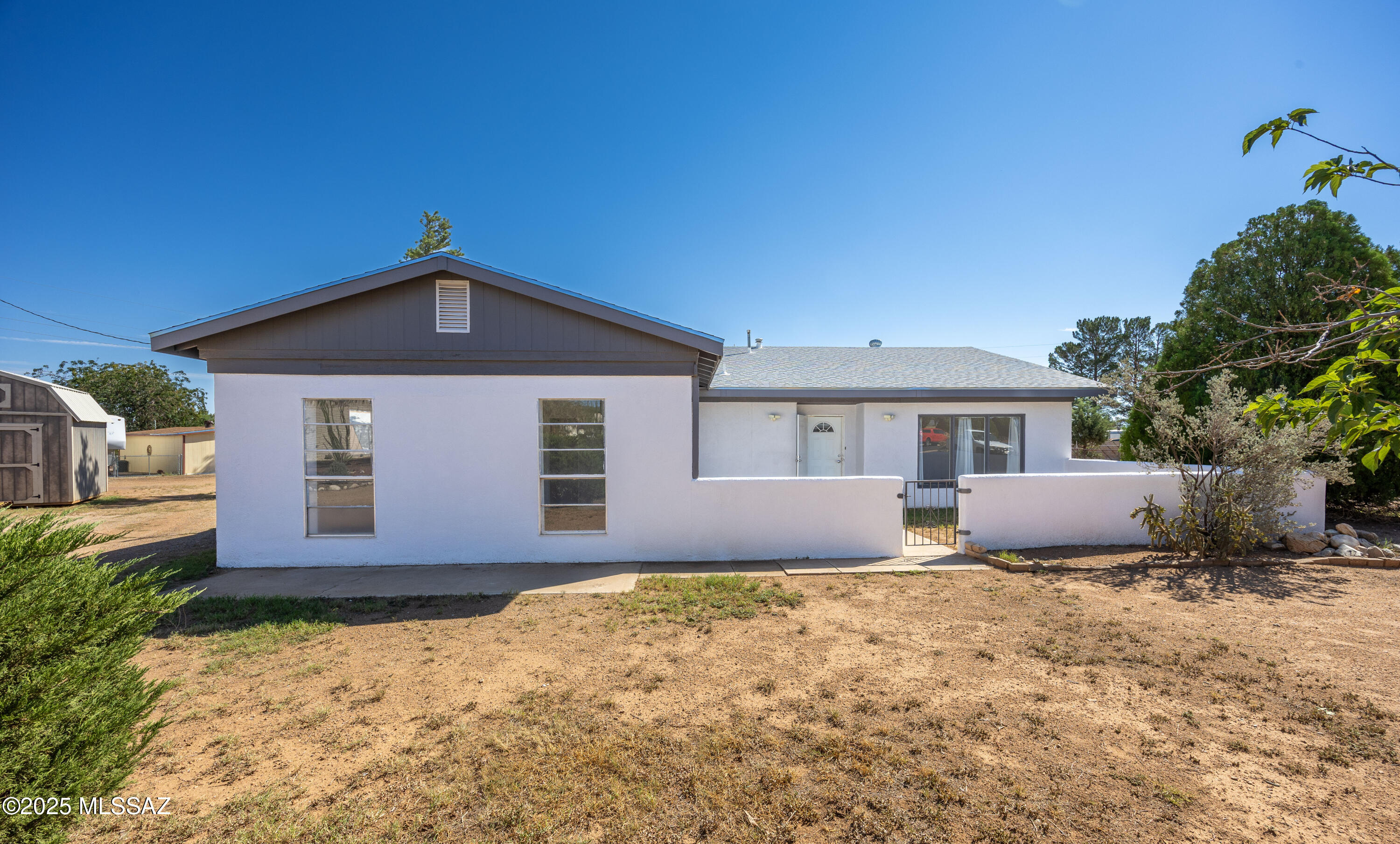 NEW IN 2023: ROOF (transferable warranty), CENTRAL A/C, 200-AMP COPPER-WIRED ELECTRICAL, NATURAL-GAS STANDBY GENERATOR WITH AUTO TRANSFER SWITCH. Quiet cul-de-sac single-level home on 0.54 acres with NO HOA. 4BR/2BA plus separate climate-controlled flex room, RV parking w/power, three outbuildings, and new 6' chain-link fenced backyard. Washer and dryer convey. Natural gas backup generator with automatic transfer switch (2023)
Upgraded 200-amp electrical service with copper wiring (2023)
New roof with transferable warranty (2023)