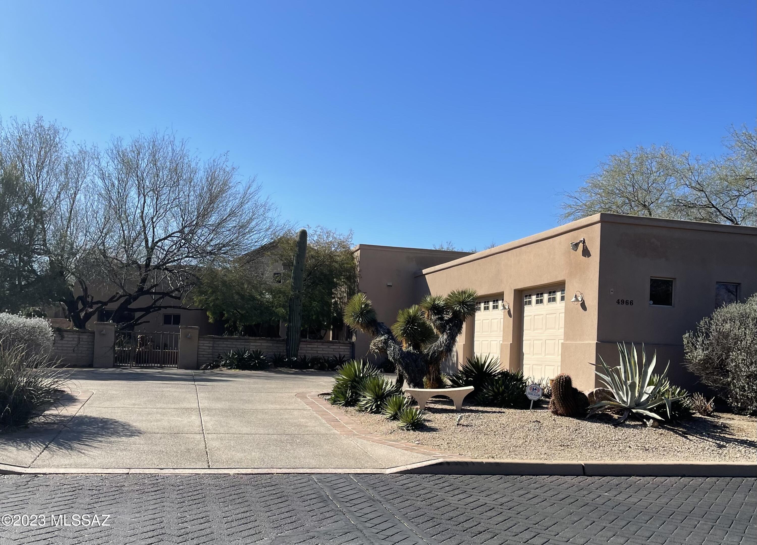 Welcome to beautiful Parade Grounds! Home is across street from a lovely park with mountain views in the background.  Enter into the charming courtyard and be greeted by a bubbling fountain. Home has 3 bedrooms plus a den.  Custom kitchen has 42' cabinets, custom pull-out shelves and a walk-in pantry, Den and i bedroom has built-in office spaces.  Backyard is an easy-care oasis with another fountain and large covered patio.
House is being sold as-is and is part of an estate and SPDS's are limited.