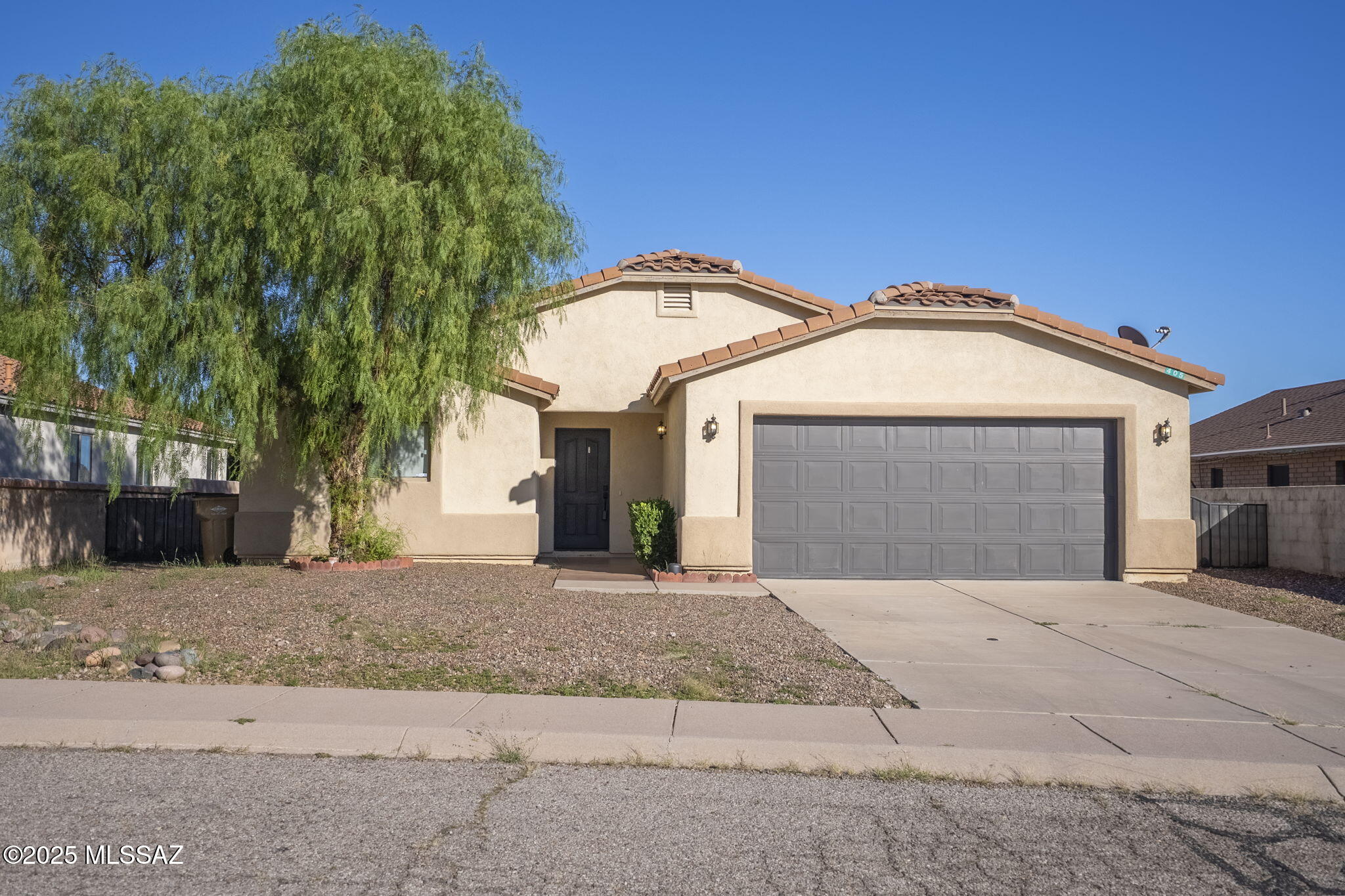 Located in the sought-after Peña Blanca Highlands planned development in Nogales, this 3 bedroom, 2 bathroom home offers 1,713 sq. ft. of comfortable living space with no HOA fees. The home features a 2 car garage, a generous covered back porch, and a spacious backyard with breathtaking views of the surrounding Atascosa and Pajarito Mountains.

Enjoy the tranquility of this peaceful neighborhood while being just minutes from the Nogales shopping center. Outdoor enthusiasts will appreciate nearby Peña Blanca Lake, a favorite destination for boating, hiking, and wildlife viewing. This property combines natural beauty, convenience, and endless potential ready for you to make it your own.