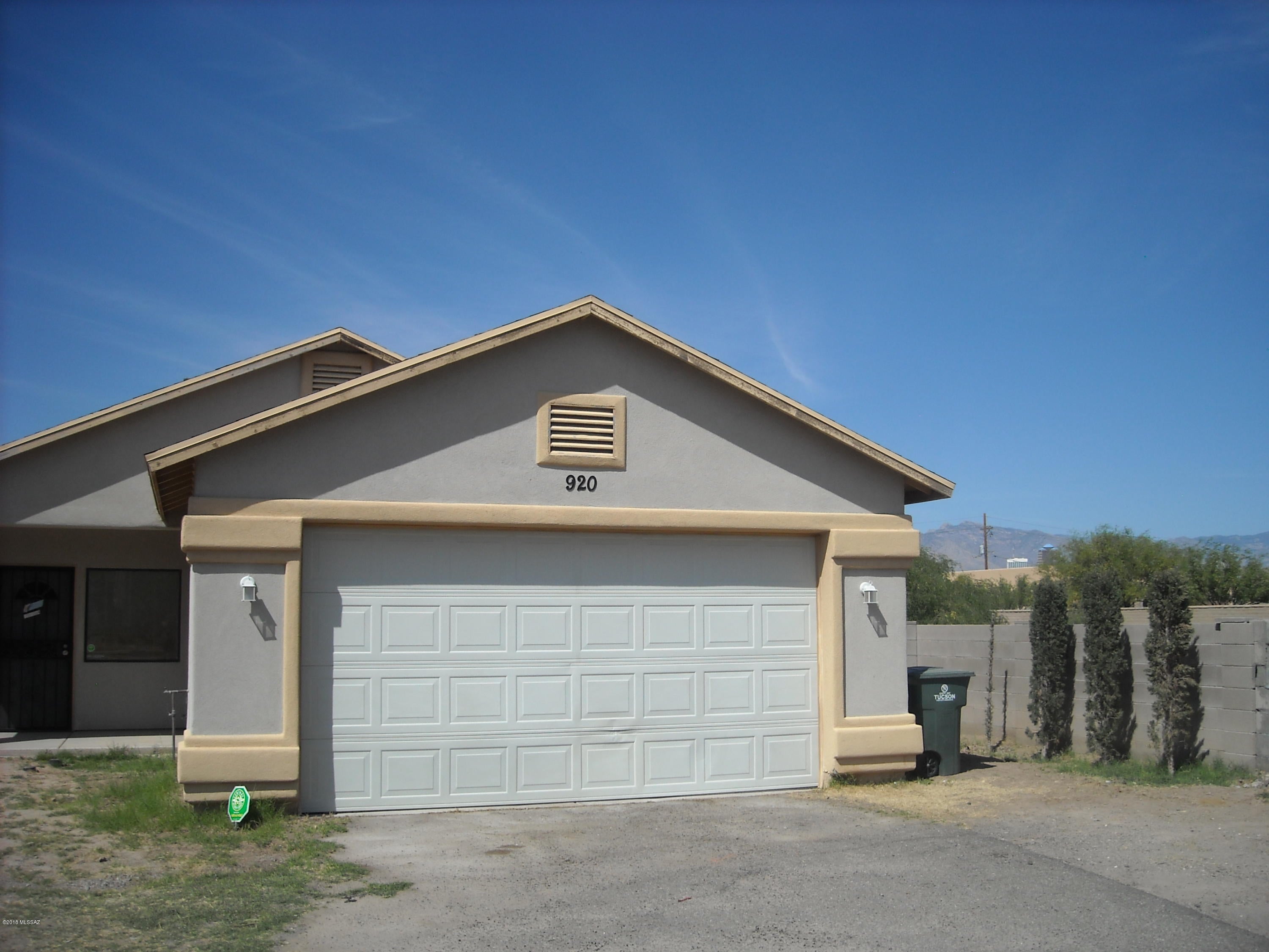 Newer home with easy access to the freeway and near downtown, Pima College and U of A. All tile floors except for carpeted bedrooms. Open floor plan and all appliances.
Ceiling fans in all bedrooms plus living room and kitchen. Master bedroom features walk in closet and entry to backyard. Pre-wired security system, 2 car garage. Fenced yard with covered patio and fruit trees