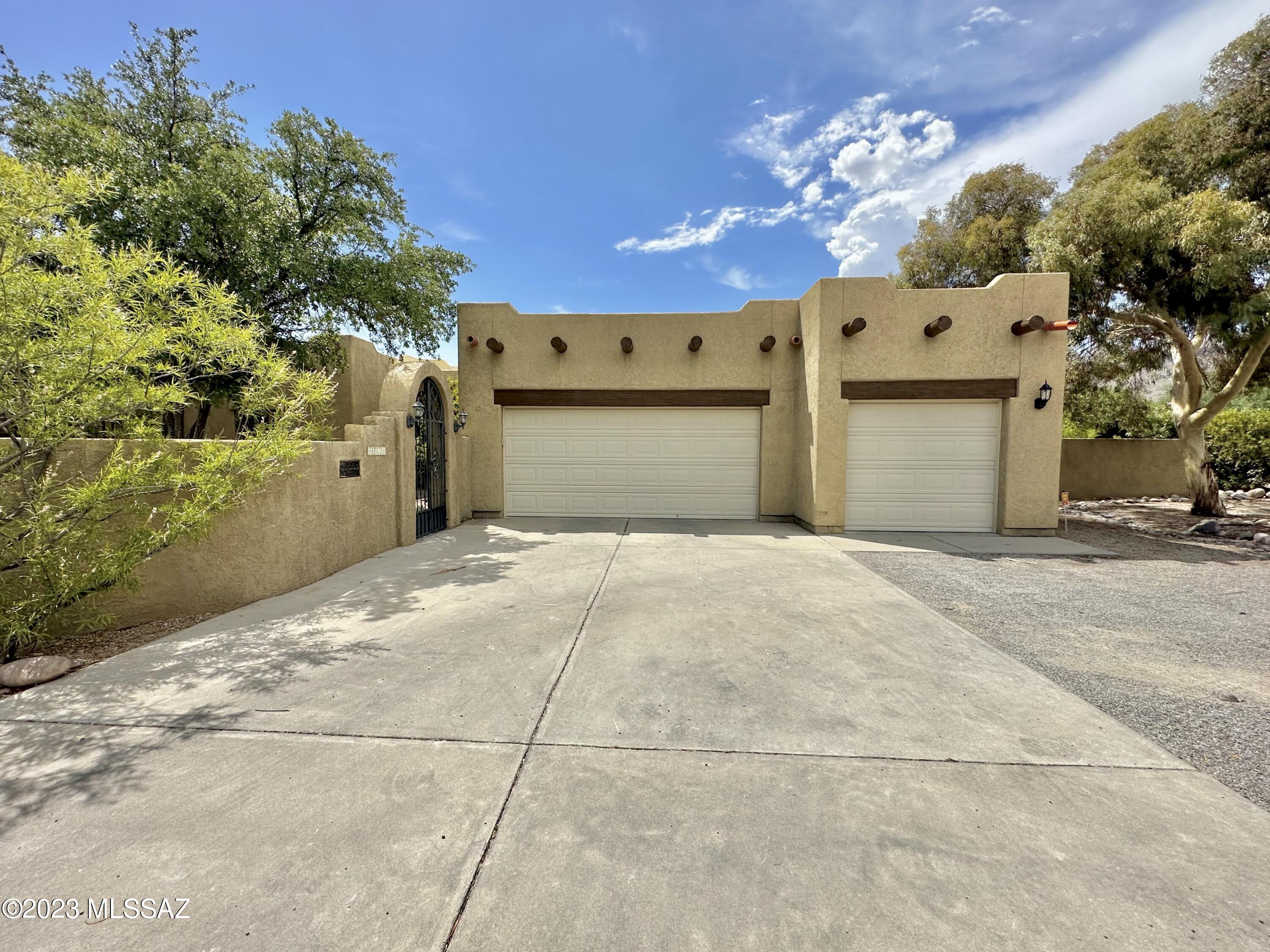 This is a unique 3 bed/2 ba plus a 1 bed/1 bath detached guest house. The home is perfectly maintained with tile flooring, plantation shutters, built-ins, and security doors. It also features a split bedroom plan, a spacious great room concept with the kitchen open to a large living room, and a formal dining room. The large master features dual sinks, a garden tub, a shower & walk-in closet. Enjoy the gas fireplace in the living room or step out the French doors to the huge backyard. You'll love the full-length covered patio. Also, the north yard is enclosed & perfect for gardening or a dog run. 3-Car garage. If pets are allowed and approved, there is a $25.00 monthly pet fee per pet, plus a $150 non-refundable pet fee, per pet. Pets are subject to owner approval. 2 pets ok.

Our residents are automatically enrolled in our Resident Benefit Package. The cost of this program is $29 per month. For more information regarding this program, please go to www.bluefoxproperties.com to the For Residents tab on the banner and click on the Resident Benefit Package on the drop down menu.
Every adult age 18 and over must complete an application. The application fee is $55 per adult. The application process includes credit, criminal, previous rental history, employment, and income verification.

Our minimum rental requirements include the following:
1.The applicants' household verifiable gross monthly income must be 3 times the rental rate.
2.All our homes are offered as non-smoking. No smoking is allowed on the premises, inside or outside the home.
3.Reasonable credit. If you do not meet our minimum credit requirements as an individual or combined if more than one applicant, your application may be declined.
4.If this property is located within the City of Tucson, housing vouchers will be considered.
5.Applicant to provide proof that debts to previous landlords have been satisfied. An eviction can be grounds for denial.
6.No felonies for the past 10 years related to property damage, illegal substance manufacturing or distribution, or assault. Other criminal activity may be grounds for denial.
7.All pets are subject to approval.
8.No bankruptcies that have not already been discharged.
9. All current or pending collection accounts owed to any utility companies must be paid in full, with no exception, and must provide a receipt from the collection agency or utility company stating the collection fee has been paid or settled.
10. You must fill out an application on www.bluefoxproperties.com. Applications submitted through any other site will not be accepted and Blue Fox will not be responsible for any refunds.

Blue Fox Properties is an Equal Opportunity Housing provider. We are also licensed REALTORS.