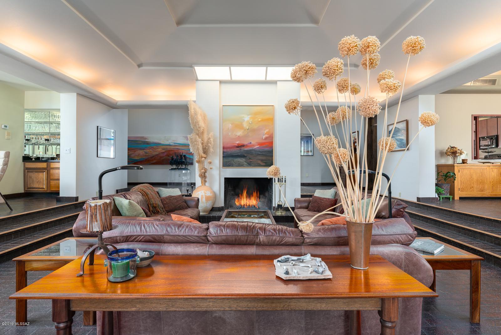 Once in a lifetime opportunity to acquire an exceptional estate built originally for the Pulitzer family. This modern masterpiece by renowned architect William Bernoudy exudes warmth from the moment you walk into the grand foyer. Main residence offers 3 en-suite bedrooms and 2 additional baths. Living, family and library/media rooms offer separate yet harmonious spaces. Dining room is the perfect place to host any gathering. All living areas offer breathtaking views with corner wall windows. Dramatic coffered ceilings throughout. Cook's kitchen to please even the most discerning home chef with walk-in pantry. Basement & wine cellar. Idyllic landscaping nestled among gentle rolling hills & oaks of Crown C Ranch. Outdoor living areas & kitchen. 2 separate guest houses. Exceptional, prestigious, & timeless