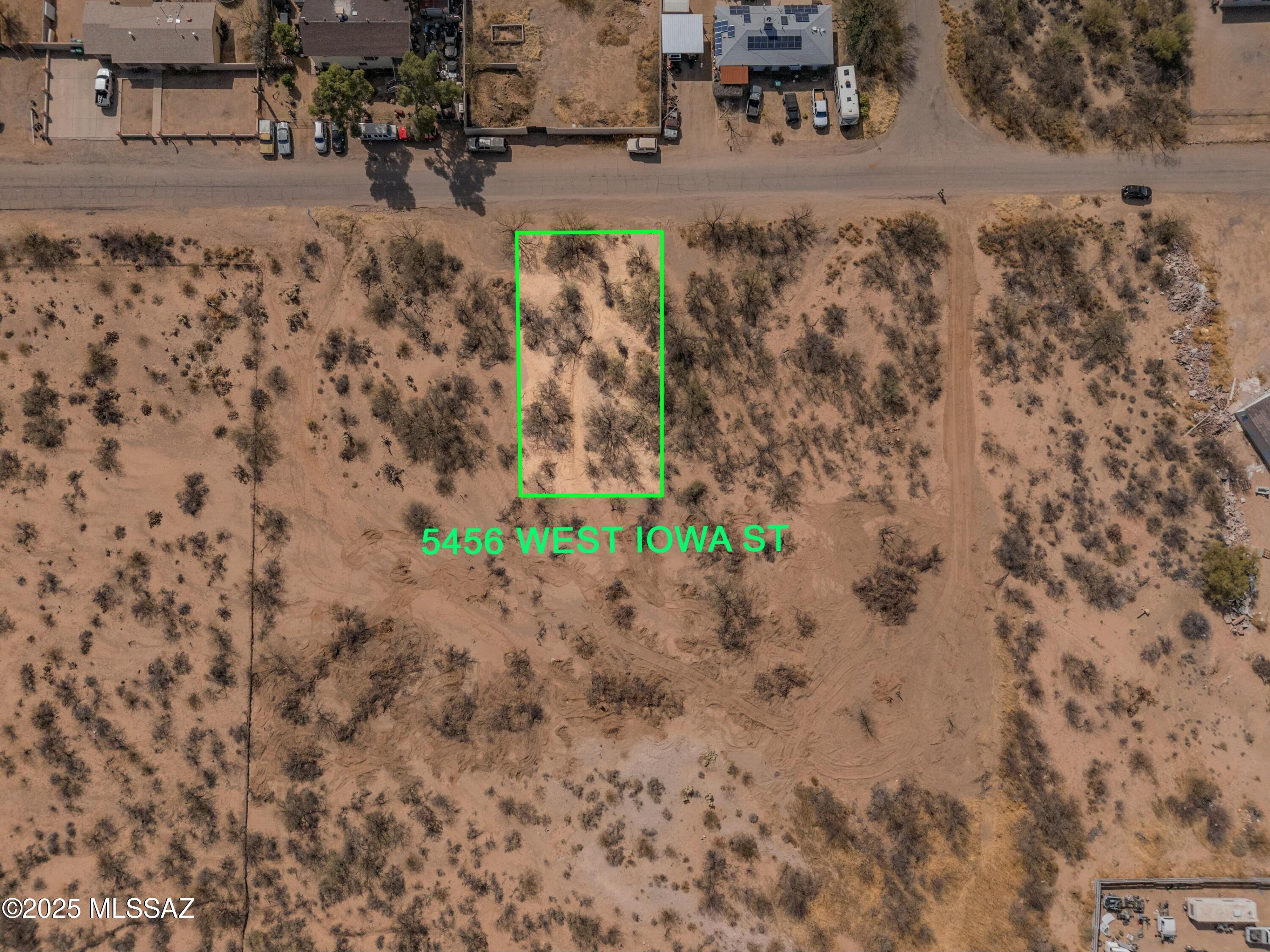 This property consists of five separate parcels which can be sold individually or as a package. The land is perfect for creating a residential community. Zoned CR3 (small site-built homes) and CB2, each lot ranges from 7,300 to 7,550 square feet. Water service is available, though it runs along Sheridan and Sunset. Developers will need to cover the cost of extending water pipes from Iowa and installing meters. Excellent development opportunity! Additional parcels are listed under these MLS numbers: 22506081, 22506078,  22506082, 22506079,  22506080. If purchased individually, a single family residence with guest house is allowed.