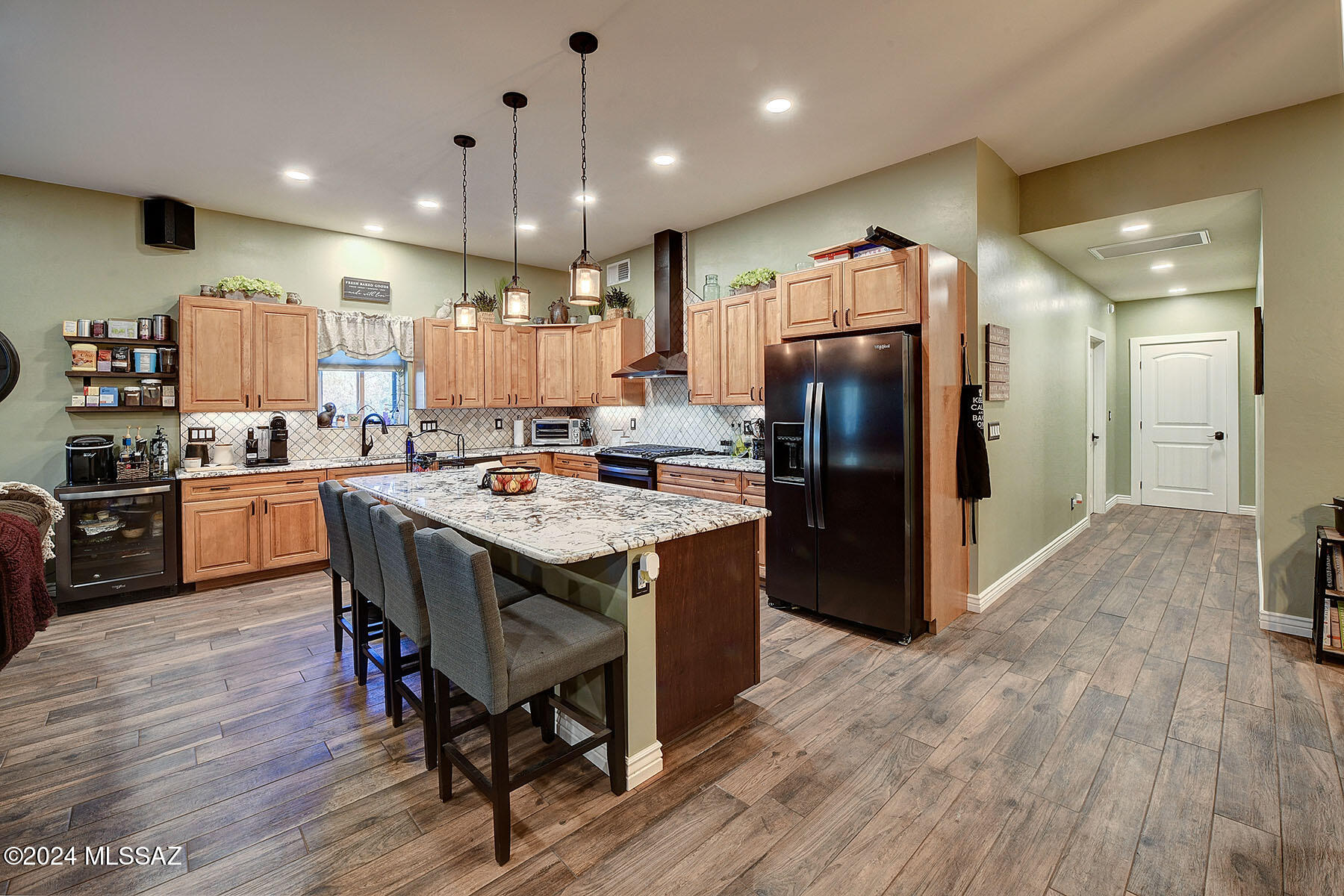 Looking for an updated home w/new Guest House on 1+ acre of Horse property in the Tanque Verde Valley? Here is your opportunity!  The Main House is; updated, ranch style, 2382 sq.ft, 4BD/2BA, w/ 2 car carport, newer HVAC (1.5yrs),newer septic system & leach field (2017),  The Guest House is; 1696 sq.ft., 2 bedroom, 1.5 bathroom, recently built, high ceilings, open floorplan, laundry room, large pantry, gorgeous chef style kitchen w/granite counter tops & large island w/breakfast counter. Primary suite w/double vanities, granite countertops, walk-in shower. Large 3 car extended garage with extra high ceilings & doors. Close to Tanque Verde Schools, hiking trails and shops. A great place to call home! > Main House & Guest House
> 1.38 acre Horse Property
> Newer Septic & Leach field (2017)
> Native Shade Trees throughout the property
> Tanque Verde School District, close to Agua Caliente Elementary & High Schools
MAIN HOUSE
> Burnt Adobe Ranch Home
> 2382 square feet
> 4 bedrooms & 2.5 bathrooms
> Remodeled in 2018
  > Quartz Countertops
  > Replaced Appliances
  > New flooring throughout the house
  > Updated lighting
  > Tub & Shower enclosures
  > Countertops and backsplashes 
  > Plumbing fixtures
> Living Room Fireplace
> Covered backyard Patio 
> New HVAC (2023)
> Dual pane windows
> No HOA
GUEST HOUSE
> 1696 square feet
> Open Floorplan
> 2 bedrooms, 1.5 baths
> Walk-in pantry
> Laundry Room
> Chef style kitchen with granite countertops
> Large island with granite countertop, breakfast counter
> Primary Suite with double vanity, large walk-in shower
> Custom 3 car garage with extra high ceiling and extended length