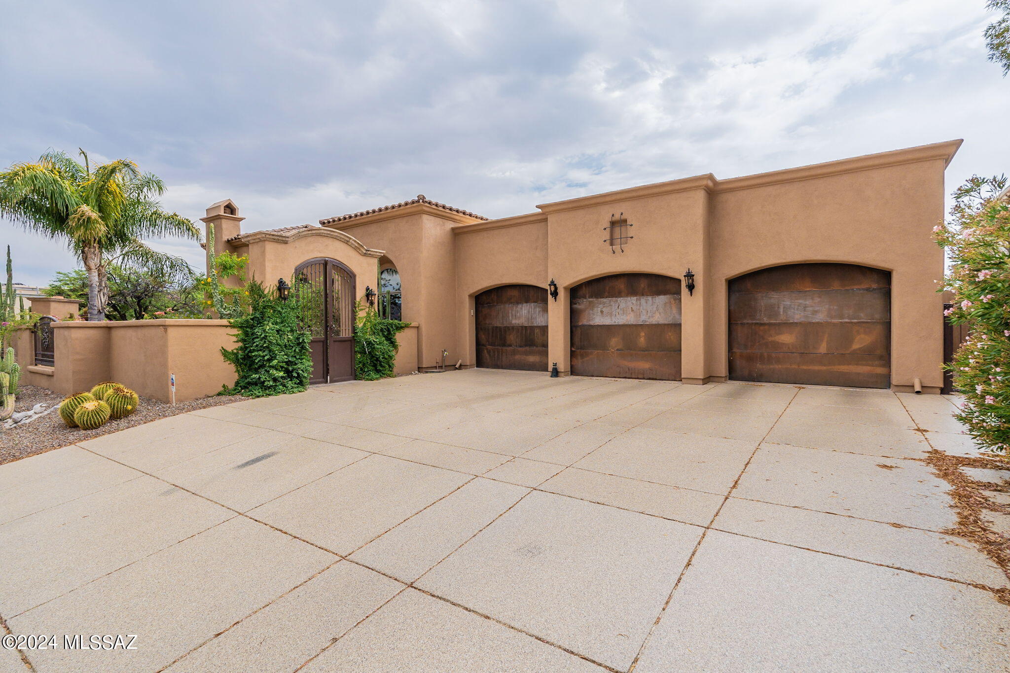 Discover the  immacuate attention to detail in this prestigious Alta Vista communty! Welcoming courtyard  entrance features a patio & an outdoor fireplace! Step inside  and discover the impressive  foyer leading to a formal living room w/fireplace & mountain views! Oversized dining rm w/built in buffets & large wine rm. Food connoisseurs will love the gourmet kitchen featuring a 6 burner Dacor stove & double ovens. 2 Asko diswashers, full size subzero refrigerator & freezer and a  lg granite island w/prep sink! Great rm w/cozy fireplace, media rm & breakfast nook! Luxurios & spacious owner's suite w/firplace! Pamper yourself w/an oversized bath featuring jetted tub, steam shower, & an emormous walk-in-closet! Fine outdoor living w/pool, elevated spa & outdoor kitchen!
A TRUE MASTERPIECE!