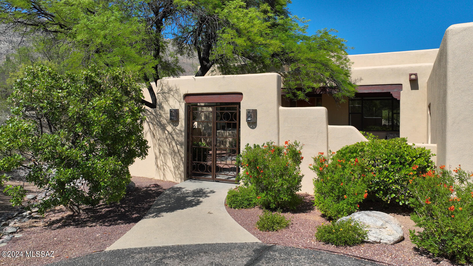 Gorgeous southwest contemporary with breathtaking mountain views in a private cul-de-sac lot in desirable Alta Vista. Amazing chefs kitchen with stainless commercial grade appliances & stunning concrete counters. Perfect entertaining home with huge kitchen bar opening to the family room & music room. Split plan features the primary suite & den on one side and the 3 bedroom 2 bath guest wing on the other. Guest wing includes it own sitting/ viewing area. Oversized dining room & 3 car garage compliment the rest. The views are up close and spectacular looking into Ventana Canyon & the Catalina's. All baths have been recently updated and are stunning. Freshly painted inside and out! Close to recreation, golf, restaurants, shopping & schools. District 16 Foothills schools. Welcome Home!