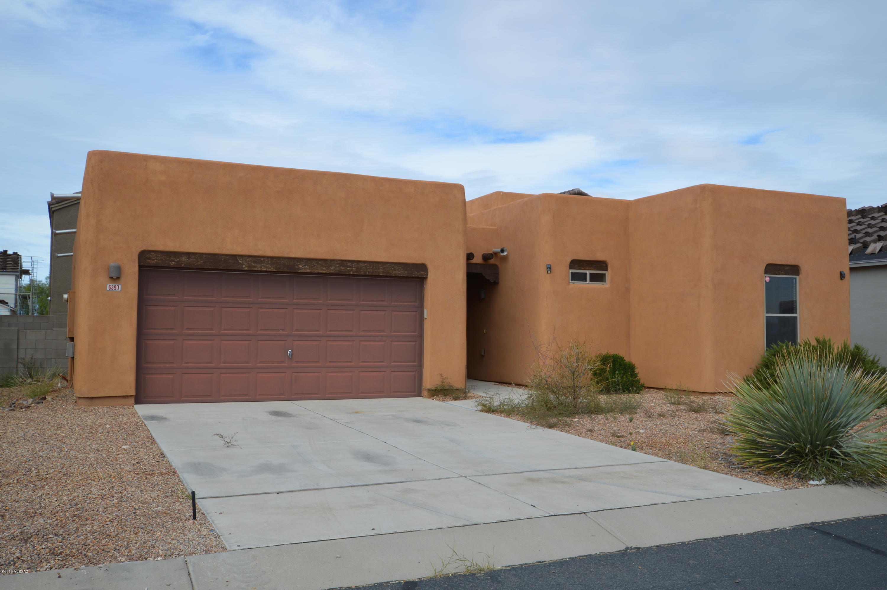 Lovely 3BR home! Just a block away from the community center which includes a pool, hot tub, clubhouse with exercise room, playground, basketball court, volleyball court and picnic ramadas! Charming Santa-Fe style home is well cared for and move-in ready. 
 Spacious living room with wood beam accents! Well-equipped Kitchen features a breakfast bar and pantry! Spacious master suite with huge walk-in closet! Located in the desirable Vail School District! Don't wait on this wonderful home! CALL TODAY!