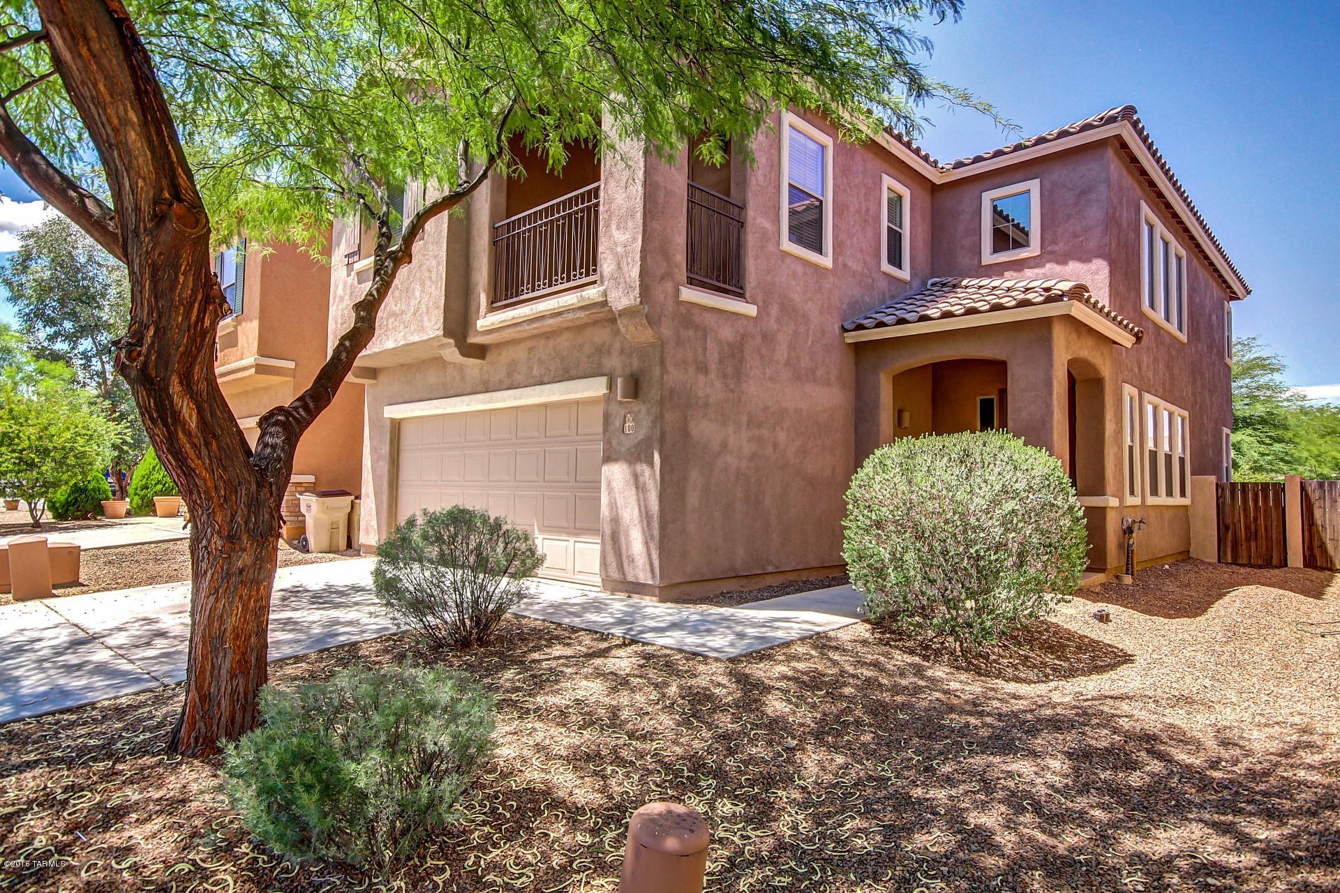 THIS HOME OFFERS THE BEST IN COMFORTABLE LIVING IN SAHUARITA, SOARING CEILINGS, LOTS OF NATURAL LIGHT, WOOD LAMINATE FLOORING,FORMAL DINING , KITCHEN FEATURES CUSTOM CABINETS, STAINLESS STEEL APPLIANCES, AMPLE COUNTER SPACE, OWNER'S SUITE IS LARGE WITH BIG WALK-IN CLOSET, DUAL SINKS & SEPARATE TUB & SHOWER. ENJOY HIGHER QUALITY OF LIFE W/ LESS YARD WORK WITH THE COMPLETELY ENCLOSED BACKYARD ,COVERED PATIO ,STONE PAVERS . YOU HAVE ACCESS TO ALL THE NEARBY NEIGHBORHOOD & COMMUNITY PARKS & POOLS.