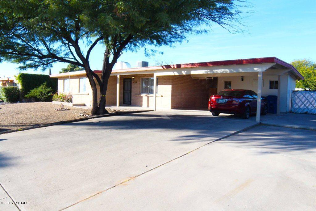 BROKER OWNER. Gorgeous 3 bedroom Ranch home for rent in convenient southeast Tucson location! Fully tiled 6''x 36'' wood-grain Italian porcelain (No carpet). In Kitchen new LED light fixture, new SS Dishwasher, new SS Oven/stove, new SS Over range Microwave & new SS Fridge. Breakfast Nook. Living room off Kitchen w/Dining Area. Spacious Master bedroom w/walk-in closet. LED Ceiling fans in all rooms. Renovated Bathrooms. Covered patio & large backyard w/ alley access. 2 car carport w/ an extra uncovered parking spot for boat or small RV. Storage room w/ washer & dryer. Brand new energy efficient Heat & AC. New window treatments. 12 month minimum lease term. Pet's require owner approval & additional deposit/fee. Proof of Renter's Insurance required at lease signing. Must see home for rent!
