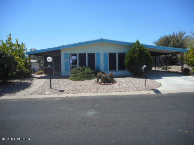 PRICE REDUCED!! Don't Lose the Opportunity to Save Thousands on this HUD Manufactured home! Charming 2bd/2ba home in a Great Age Restricted community with lots of Amenities! Awesome open floor plan with wood beam ceiling, dining area has built in hutch, roomy family room. Kitchen has plenty of cabinets & breakfast bar! Full length carport on one side of the house, other side has screened in Arizona Room, covered patio with gated yard & mature shade trees! Buyers will be financially responsible for dewinterization/rewinterization fees & for utility turn-on for inspections. Square Footage, # of Bedrooms/Baths & Property Address are per FHA Appraiser. BLB Resources makes no warranty as to prop conditn. Buyers to verify all Info.