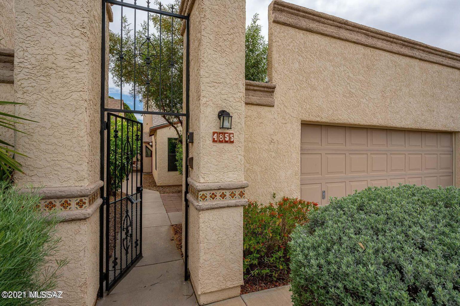 PRIME LOCATION....One of a kind updated house with a cozy fireplace nestled in Northwest Tucson!, Conveniently located just minutes to the AZ Pavilion Outlets, I-10 FWY and more! This remodeled house boast of a spacious kitchen with plenty of storage, granite counter tops and stainless steel appliances. 2 large bedrooms and spacious bathrooms. Lush and serene low care backyard has plenty of area to add a garden. Front yard is maintained by HOA. Enclosed 2 car carport Transferable home warranty, Roof 3-4 years old w/warranty, maintained HVAC, updated windows & full size washer/dryer. Enjoy the Countryside Club amenities; Rec Center, Park, Pool/Spa and more!