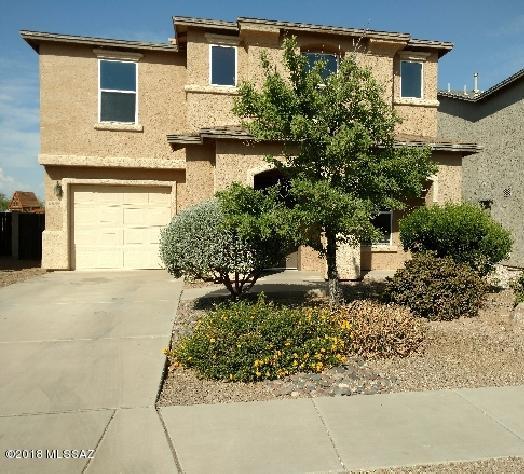 Contemporary two story home with easy drive to DMAF, U of A Tech Park, and quick access to I10. Spacious living room opens to kitchen and dining area. Black appliances in kitchen and abundant cabinetry. Upstairs loft can be used as den/game room/family room.  Bedrooms are all good sized. The huge back yard with no neighbors behind offers privacy and mountain views. Home is sold as is. Employees and family members residing with employees of JPMorgan Chase Bank, N.A, its affiliates or subsidiaries are strictly prohibited from directly or indirectly purchasing any property owned by JPMorgan Chase Bank, N.A  WE ARE NOW IN A MULTIPLE COUNTER SITUATION. SUBMIT HIGHEST AND BEST BY 11 AM on 8/13/18