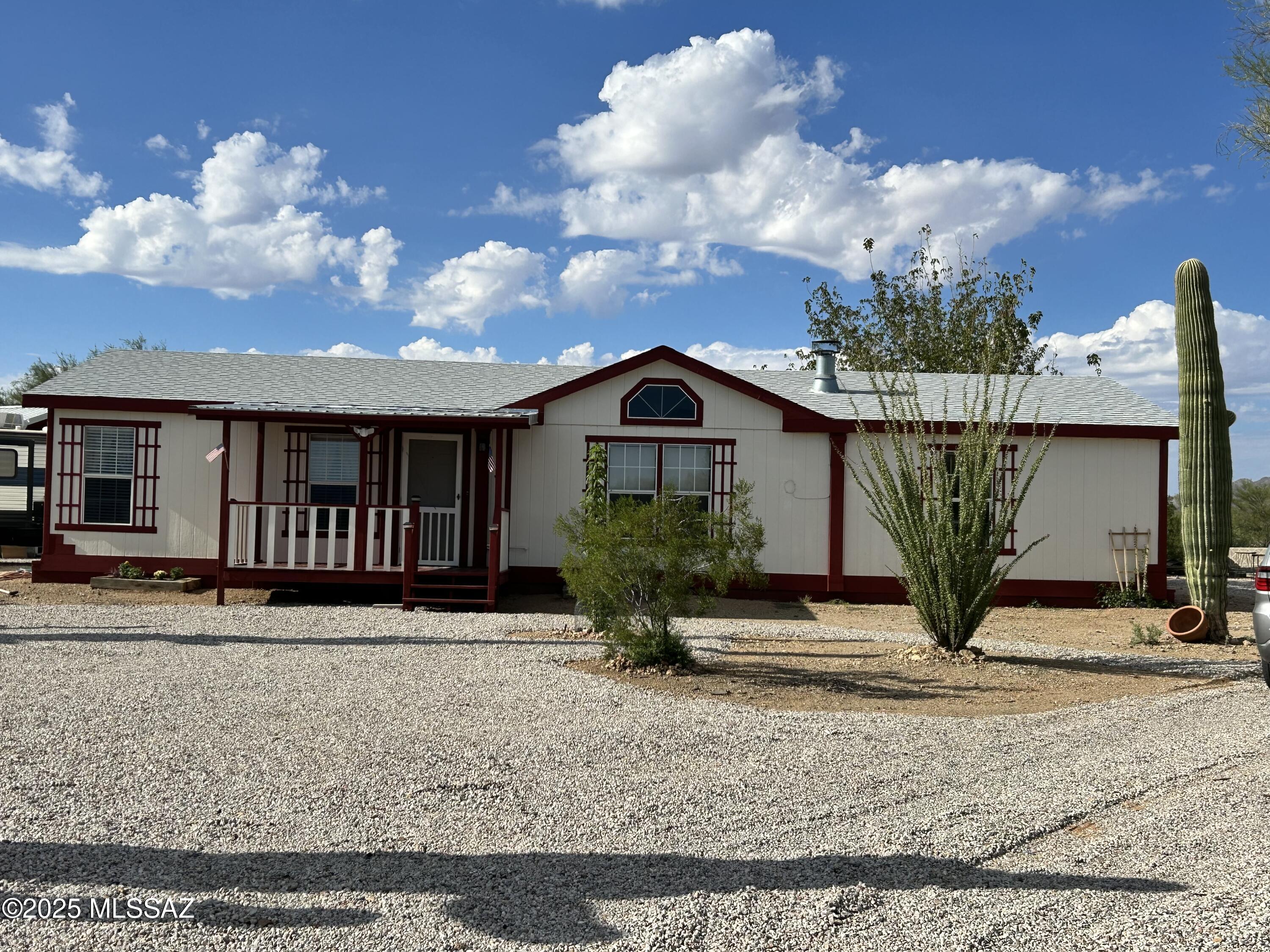 Away from the city hustle but convenient to everything! You'll love this remodeled 3 Bedroom 2 Bath home on just under an acre. Located near the end of a cul de sac and backing up to federal land, the privacy and views are hard to beat. Some of the features include New Laminate wood flooring throughout, new light fixtures, wood burning fireplace, remodeled kitchen and baths with new stainless appliances, walk in closets in all bedrooms. new a/c furnace and water heater. outside there is a huge shed with a loft for extra storage and a separate garage/workshop. Come quick, this will not last!