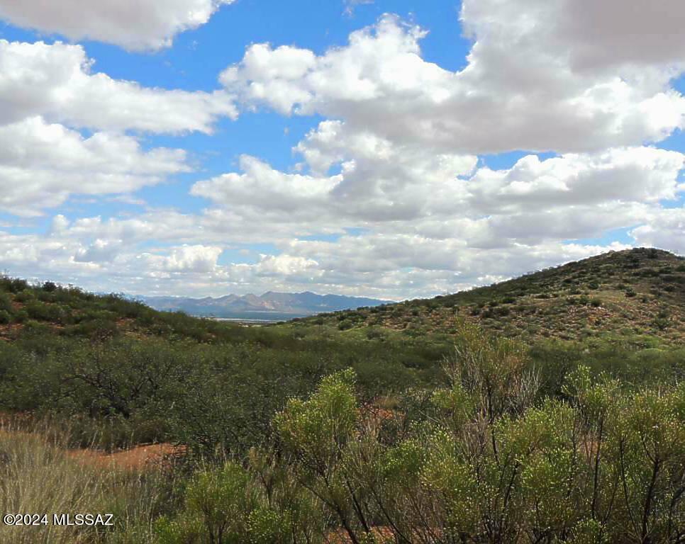 Come see this 38.6 ACRE parcel of beautiful rolling hills in High Lonesome Estates.  Situated in a friendly community of mostly Horse Properties.  You can ride for days on the maintained dirt roads!  Wake up each morning to awe-inspiring sunrises in the East and drift off to sleep each night with the tranquil sounds of nature.  Spectacular views in all directions!  Ideal location for those seeking privacy but with easy access.  With the darkest skies, you can gaze at the stars all night.  The electric is a distance away but isn't an issue with Solar Power becoming so affordable.  Escape the chaos of the city and come enjoy the peace and quiet of the county!  Seller might consider financing.  All terms to be negotiated.