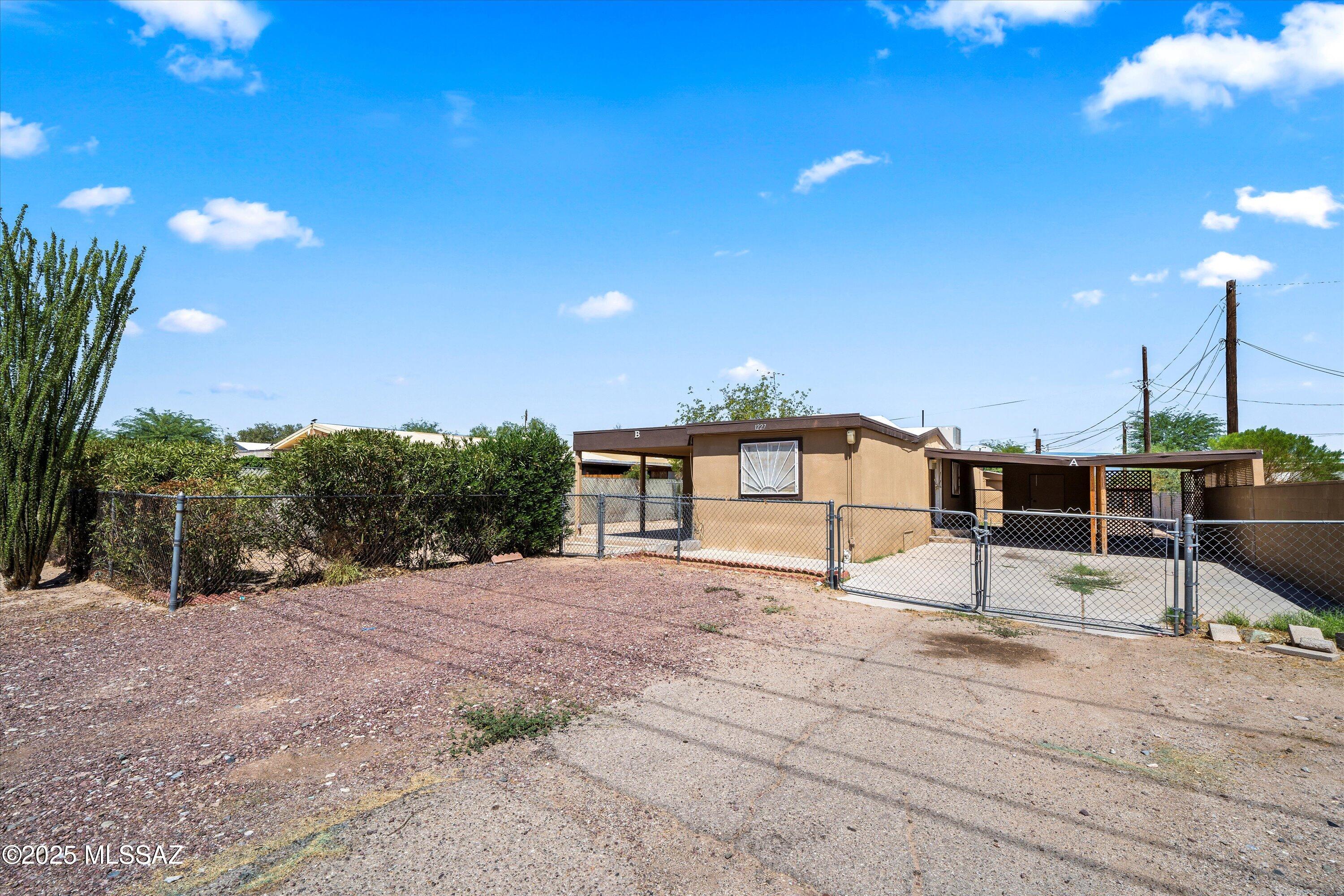 PLEASE READ: ***CASH ONLY. PRE-1974 BUILT MANUFACTURED HOME *** BOTH SIDES ARE TENANT OCCUPIED. Home will only be shown with an accepted offer. Excellent income property or primary home with guest home possibilities. The east side unit offers an open floor plan with split bedrooms, and a large kitchen, and the west unit provides a nicely sized bedroom, full bath and open kitchen and living area.

Each unit has its own laundry and dedicated fenced in area. If desired, the home can also be combined into one residence. Lots of potential, possibility and opportunity! The home has been freshly painted inside and waiting for its new owners.