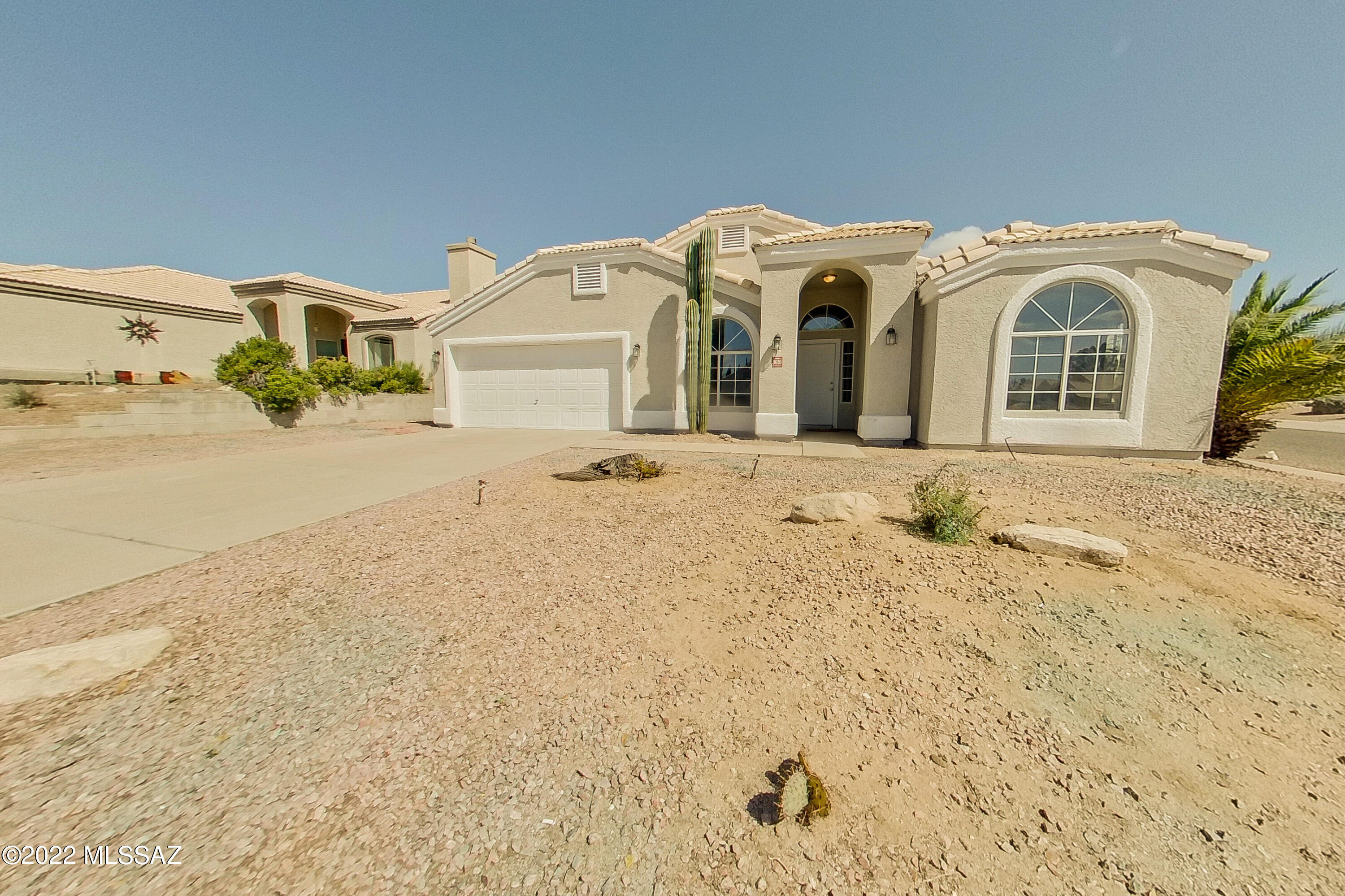 Georgeous 3 bedroom 2 bath home located in the Thornydale Terrace Subdivision. Great NW location closet to I-10 freeway schools, shopping, and dinning. This home has been updated with a fresh coat of interior/exterior paint and new carpeting throughout. Kitchen features bright cabinets, laminate counters, and stainless steel appliances. Large backyard features desert landscaping and an extended slab patio. Don't miss this one!