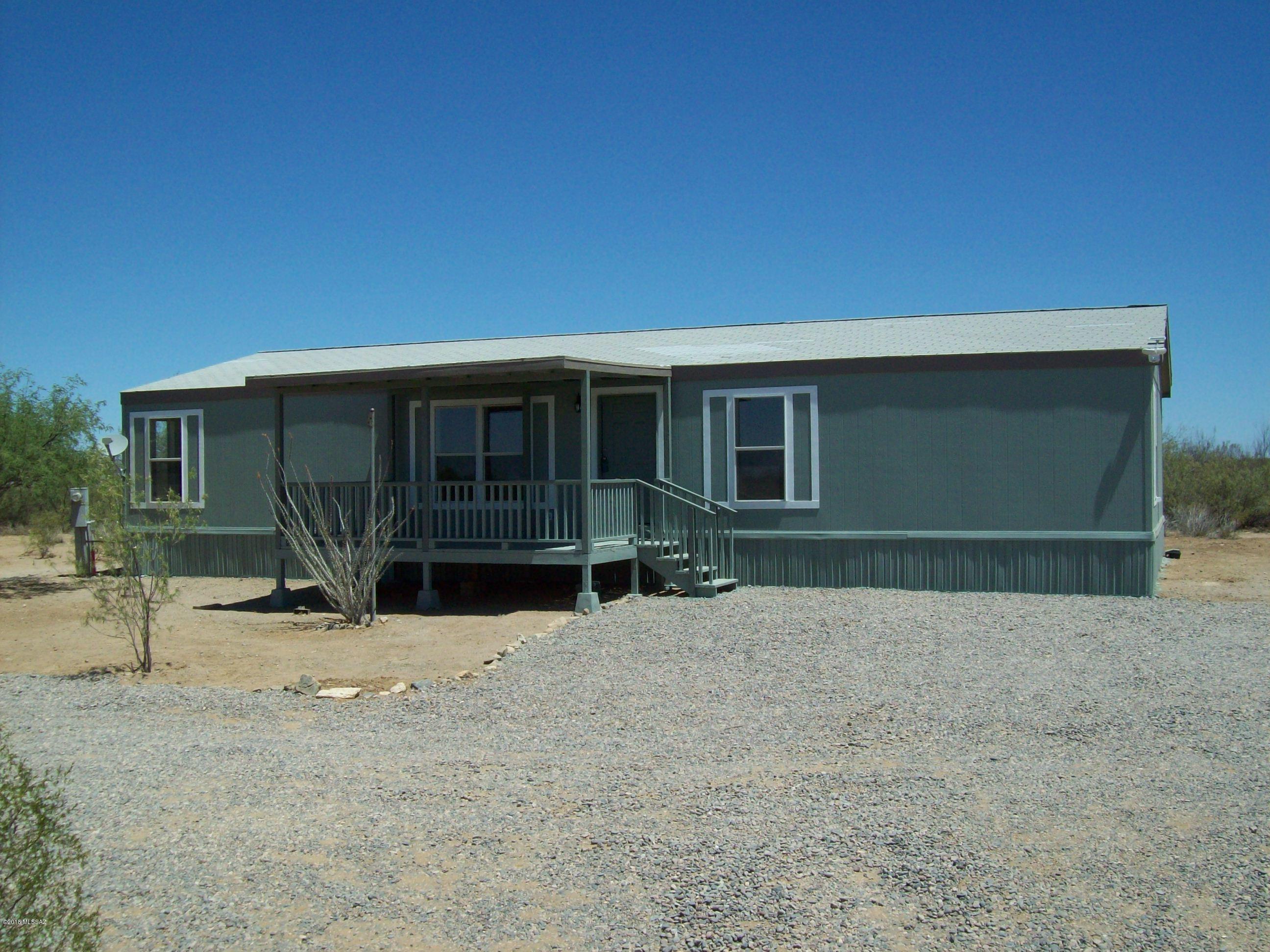 Bring the horses, bring the toys! This home has been upgraded to better than new. The kitchen has new granite counters. There is also granite in both bathrooms. New carpet and tile floor. Fresh paint inside and out. Enjoy the great mountain views from the rear deck. Plenty of land to improve the way you want to.