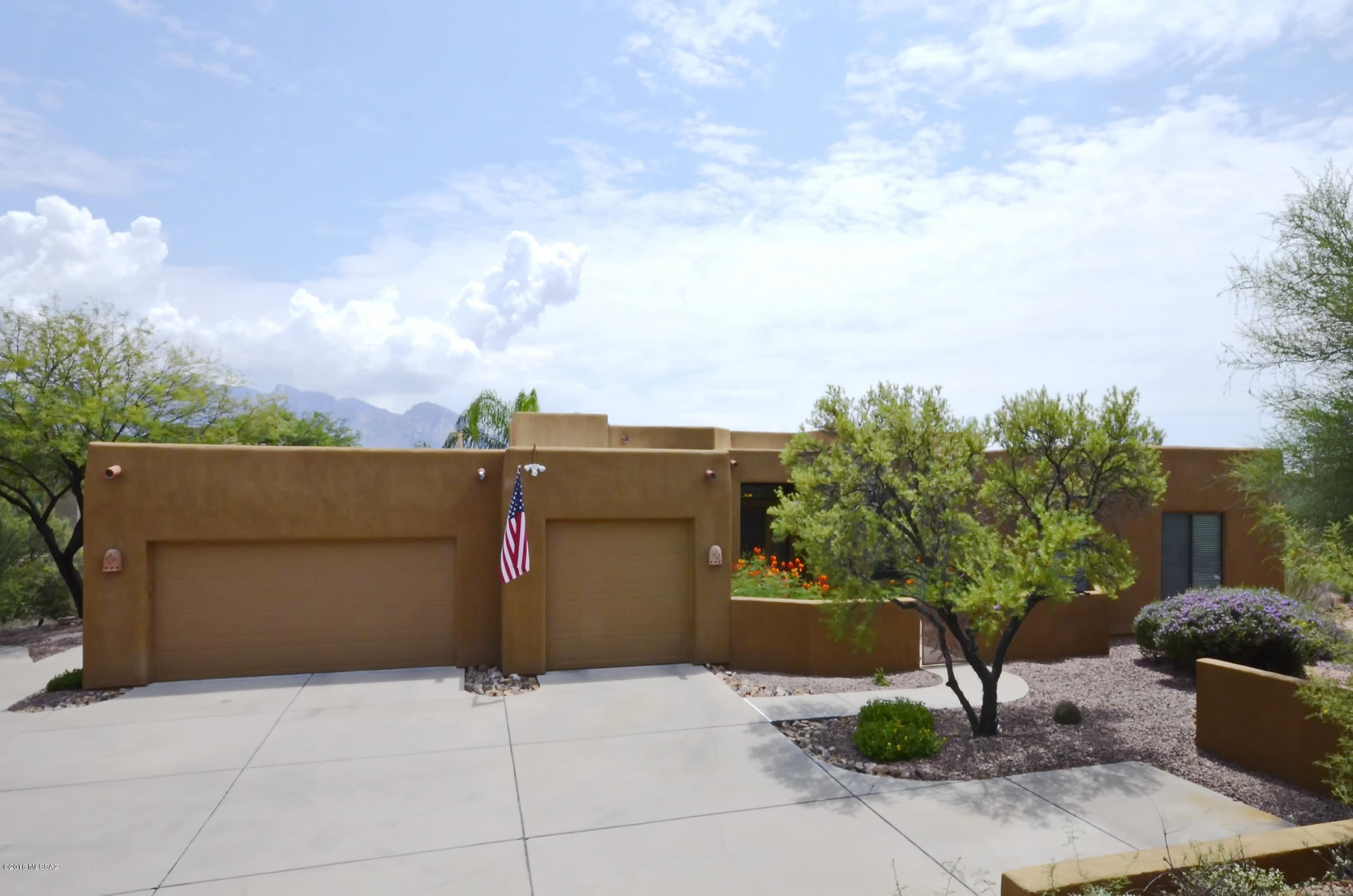 Fabulous four bedroom, plus den, three full bath, semi-custom home in wonderful Vistoso Estates. Long winding driveway leads to private southwest contemporary home which fits any lifestyle. Open kitchen to greatroom with fireplace. Formal dining area, separate den off greatroom. Second family room, or teen room leads to terrific guest suite. Concrete floors in living areas. Great entertaining rear yard with pool/spa and grill area under lattice patio cover. Large windows and sliding glass door offer abundant natural light and allow for great mountain views. Private cul-de-sac lot. Over-sized three car garage. New stainless steel appliances. Great home, lot and neighborhood.