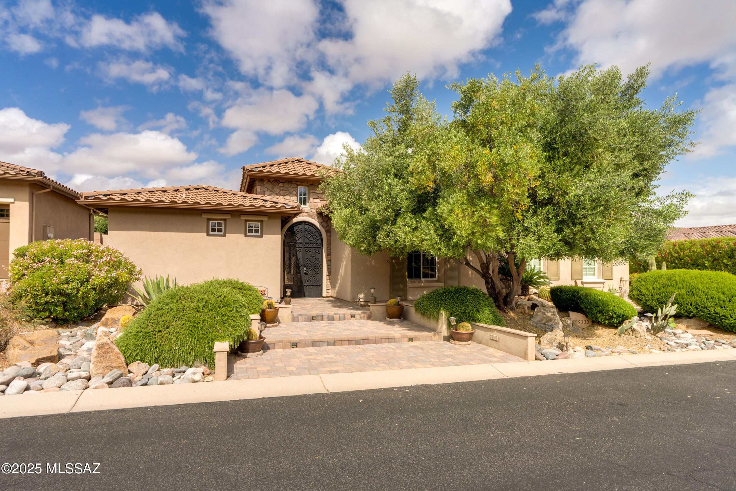 Experience luxury living in this stunning Sonoran model 2BD/2BA main home (3265 SF) with detached 1BD/1BA casita (426 SF) in SaddleBrooke Preserve, an exclusive 55+ active adult community. The home features a highly upgraded chef's kitchen with premium finishes, spacious open living areas and elegant design throughout. Custom den/office and owner's suite closet built-ins. Step into your private resort-style backyard complete with sparkling solar heated pool, outdoor kitchen, fireplace and lush landscaping perfect for entertaining or relaxing. Home has two new HVAC units ($26,000) with transferable warranty and a brand new irrigation system. Enjoy the best of desert living with access to community amenities including golf, fitness and social clubs. This is Arizona retirement at its finest!