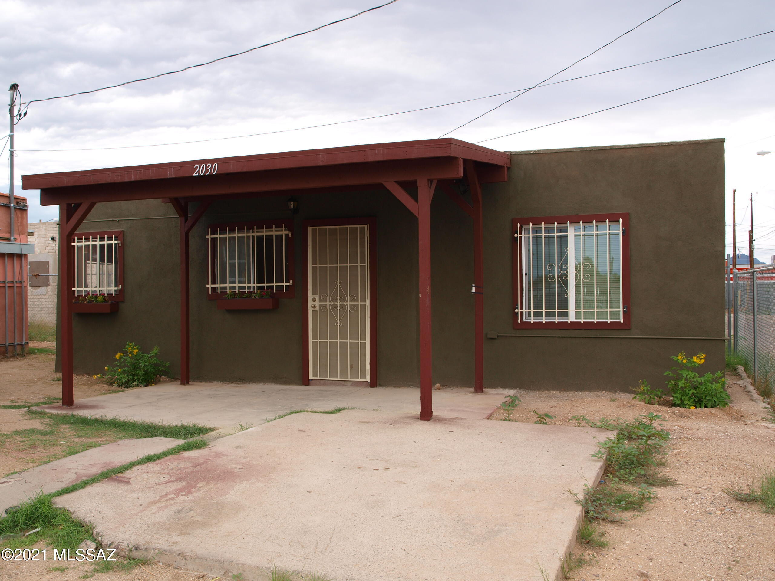 This property offers great rental income with a Tri plex and two detached casitas.  Tri plex has 3 studios and casitas are 1 bed/1 bath each. All units have been modernized and updated.  New wiring, plumbing and sewer 7 years ago. Coin-op laundry facility on property.