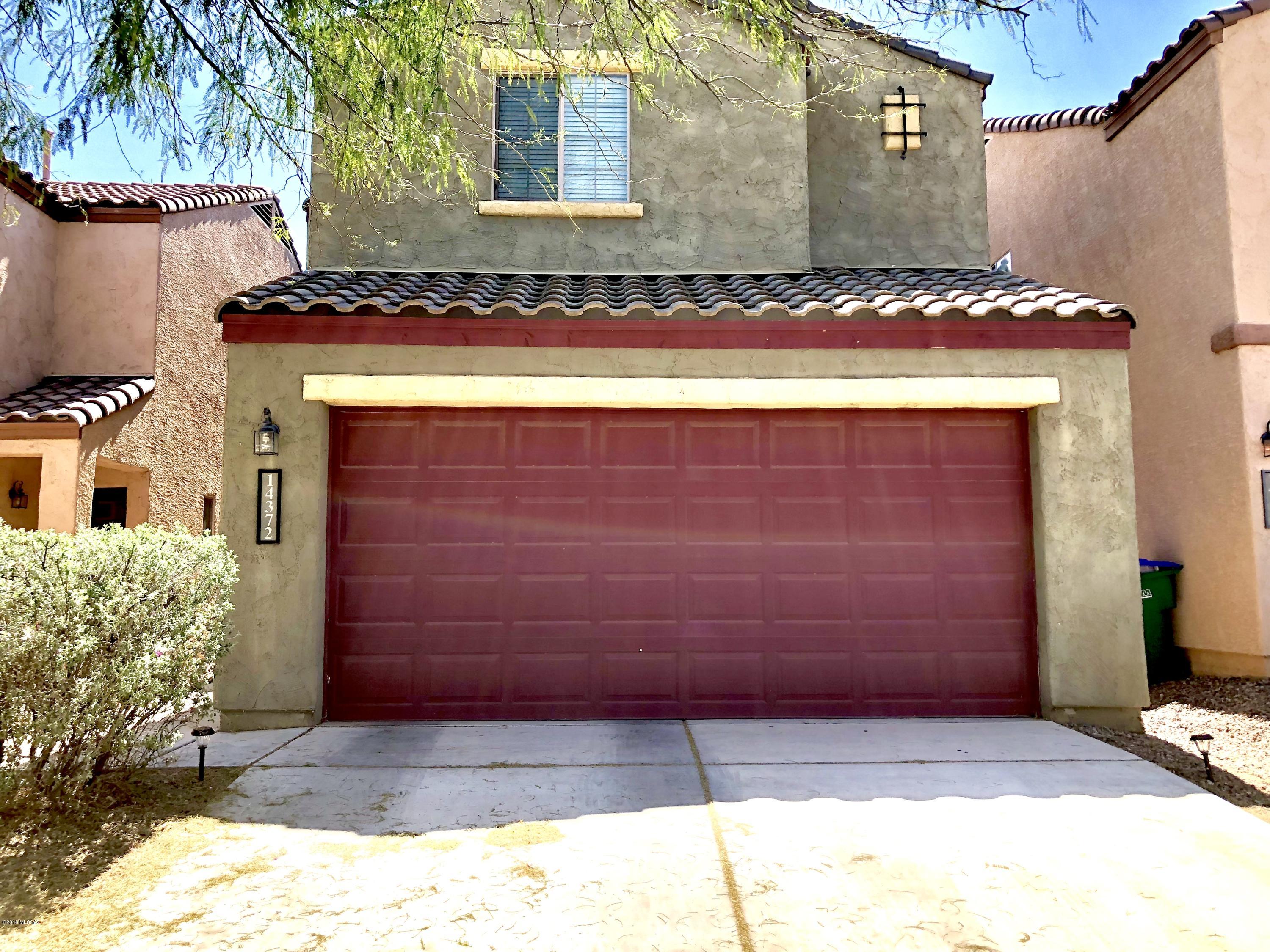 Beautiful two-story home located in the highly desirable community of Rancho Sahuarita! Gorgeous abundance of ceramic tile throughout this home with a beautiful interior paint scheme! This open floor plan with large kitchen includes all black appliances and cabinets with crown molding! Big master bedroom has walk-in closet! Backyard has been landscaped to your expectations! Rancho Sahuarita can provide you with the perfect family functions at nearby parks, pools, recreational center, basketball and tennis courts and so much more! Close to shopping centers, schools and easy access to the interstate!