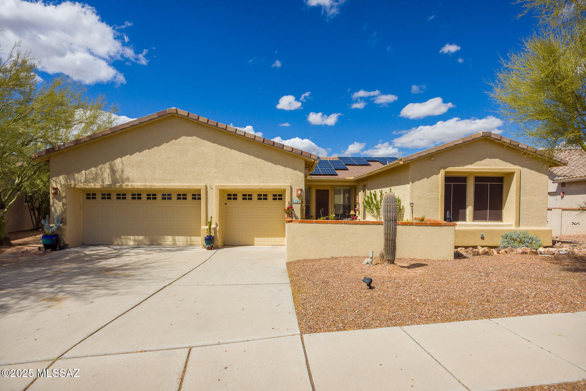 Stunning home in Copper Ridge II. 2,940 sq ft 3 bedroom/den. Sellers have invested numerous upgrades into both interior and exterior. Remodeled kitchen with all newer SS appliances & quartz countertops. Convection oven/micro combo. Induction cooktop & walk-in pantry. Primary suite has bay window, fireplace & 13'x14' custom closet. New ceramic shower & tile. 4' extension to back of home gives an open, spacious floorplan with wide, handicap-accessible hallways. 9' ceilings. No Carpet. Custom classy closets in all bedrooms. Built in office with murphy bed. Split bedroom plan. Newly landscaped back yard with heated, pebble-tec pool/spa with water feature & lighting. Outdoor kitchen features grill and beverage frig. SOLAR OWNED. 3 car garage. Absolutely gorgeous!