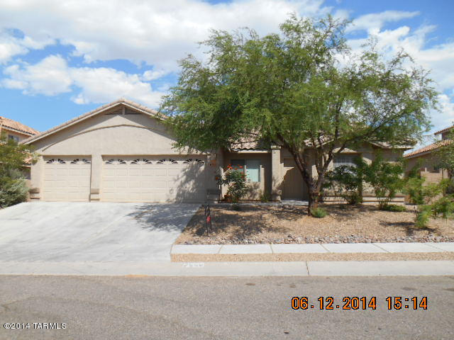 Updates galore in this beautiful home with upgraded kitchen cabinets, breakfast bar, granite counter tops, built in entertainment center, and built in office with granite counters. Other features of this home include a huge master bedroom, extensive tile flooring, upgraded fixtures and more! The large back yard is great for entertaining with the extended patio, built in barbeque, and fruit trees. The refrigerator is included with this home. This home can be rented for 12 months or longer.