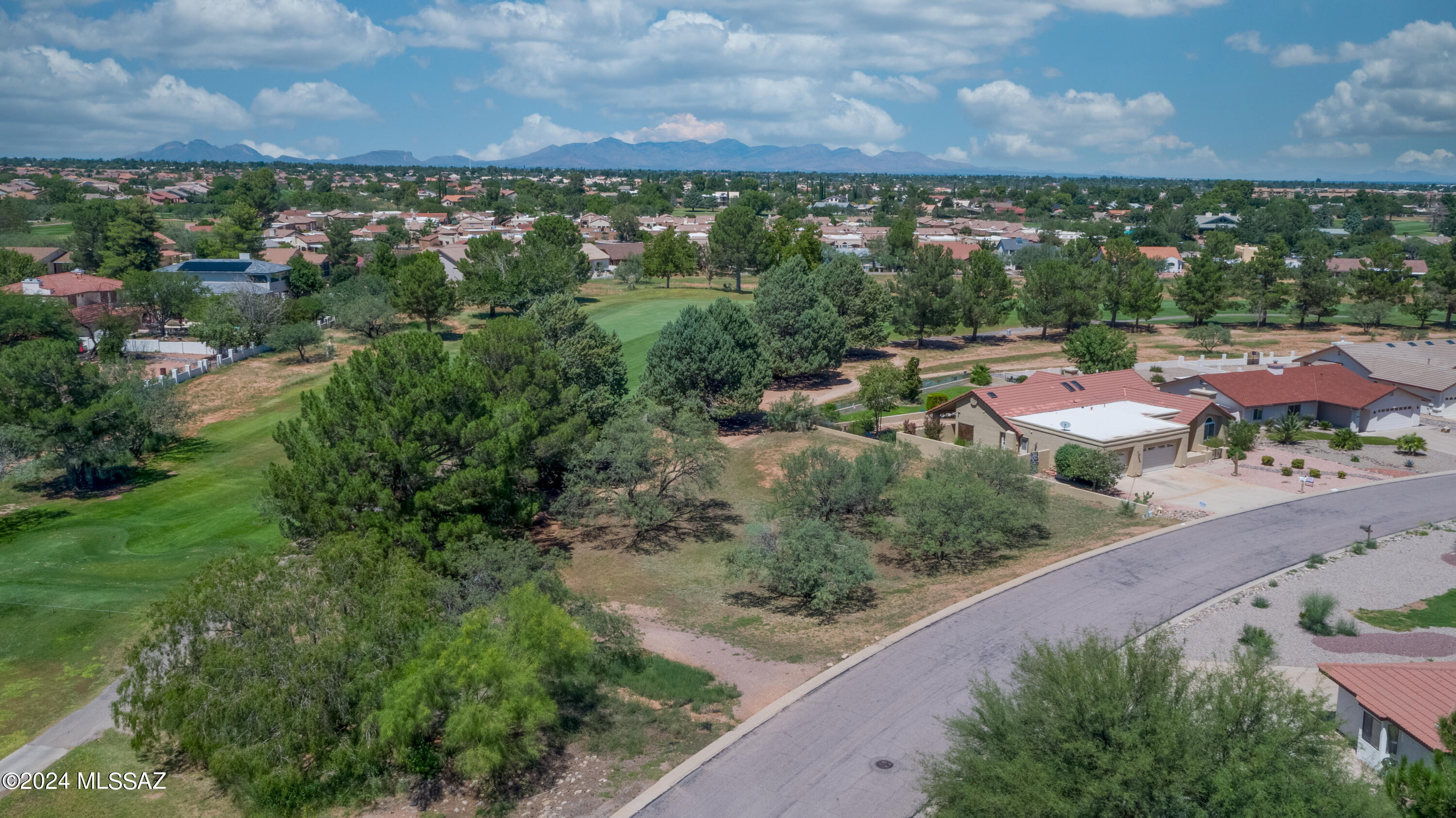 Build your DREAM home on the Golf Course!!! This property is one of the last available lot on the course and is in a park-like setting on the 6th TEE Box, and a VERY private street!!! It's just waiting for your custom build, and we'll find you the Builder!!! It features mature mesquite trees in just the right places for you to keep and use for shade...there are also fabulous Mountain Views, and of course, the Golf Course for you to have green all year long with no maintenance to you, plus golfing and hiking and birding weather year round too!!! It's the epitome of peaceful living...I know...I live on #1!!! Come see and imagine the possibility...you won't be disappointed!!!
