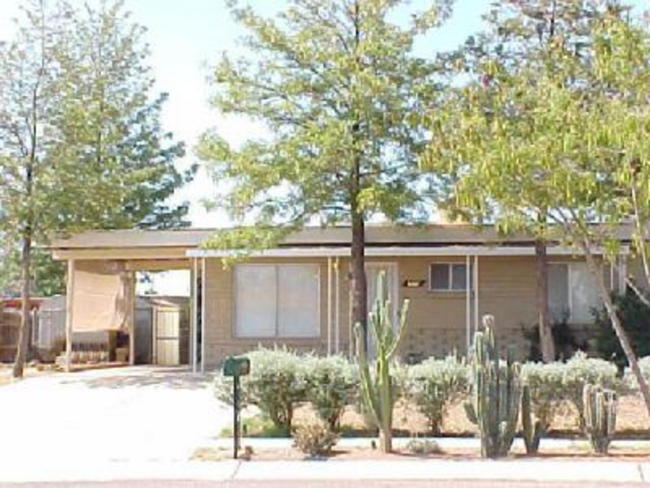 Charming home with lovely back yard! Huge living room and Kitchen! Big rooms! Secluded far enough away from major thoroughfares to be nice and quiet, but close enough to have great access! Just down the street from DMAFB! Open and bright floor plan. Really cute!! Don't miss out on this one! CALL TODAY!