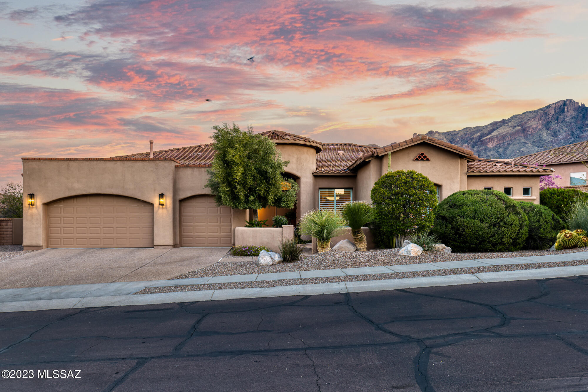 Welcome to this magnificent residence, seamlessly blending contemporary and timeless design in the highly coveted gated community of Pinnacle Ridge.  Recently renovated to the highest standards, every aspect of this home is thoughtfully designed to offer unparalleled luxury, comfort, and style. Prepare to be captivated by the breathtaking mountain views, panoramic sunset and city vistas, refined interiors and superb amenities that will surpass your every expectation.

As you step inside, you are greeted by exquisite interiors, abundance of natural light, dramatic high ceilings, panoramic picture windows, and an impressive floor plan optimized for modern living. The gourmet kitchen is a chef's dream, equipped with state-of-the-art appliances, a center island, and ample counter space. The bedrooms and bathrooms are equally remarkable, providing an ideal sanctuary for relaxation and privacy. The primary suite is a genuine retreat, featuring a spa-like bathroom, steam shower, and dual walk-in closets.

The impeccably landscaped resort-style backyard, offers a perfect haven for year-round relaxation and entertainment. From the spectacular mountain backdrop, the sparkling pool and spa, to the built-in BBQ and basketball pad, every detail creates an inviting space, and an effortless flow between the living spaces. 

This exceptional property is truly remarkable, located in one of the most desirable locations in the city, the Catalina Foothills.  This area boasts many of the city's upscale shopping boutiques, fine dining, art galleries, major resorts, country clubs, top-rated schools, world-class golf, tennis, and hiking trails. 

Schedule a private tour today.

Extensive list of upgrades and floorplan available under documents or upon request.