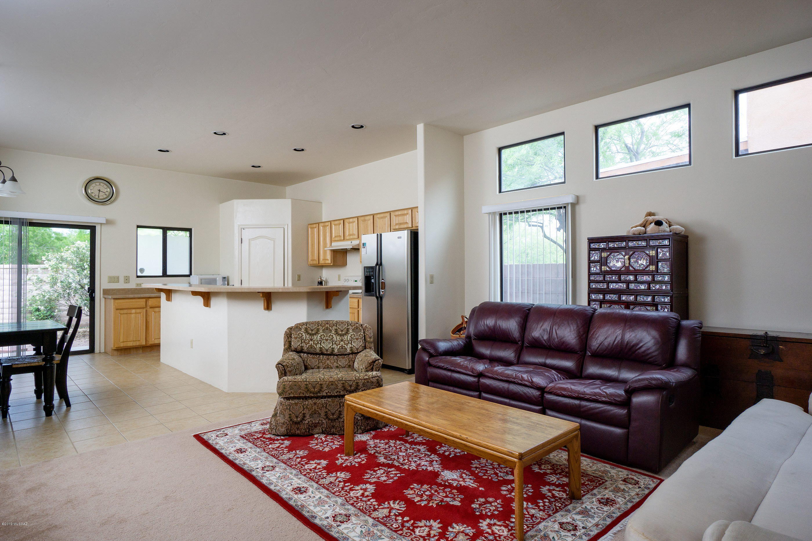 This is the first time on the market for this home in the highly-desired Star Pass gated community! This 3B/2BA single-story home has a split-bedroom open floor plan with great room concept featuring lots of windows, recessed lighting, and rounded corners. The fabulous kitchen has a spacious island breakfast bar, gorgeous cabinets, and a large walk-in pantry. The master suite has a walk-in closet and the bathroom features dual sinks and a combined bathtub and shower. The third bedroom has double doors and could be used as an office or a comfortably sized guest room. The large laundry room has built-in shelving and room for extra storage. Easy care landscaping in the front and back yards and a beautiful neighborhood park, the I-10 freeway, Downtown, the U of A, Tucson International airport.