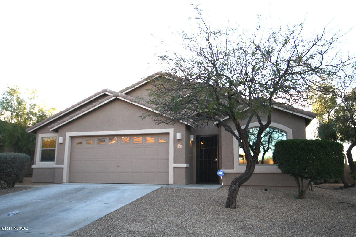 Built on a view lot with NOS space to natural desert this home is ready to move in! Landscaped for entertaining the backyard features Pebble-tec pool with cool deck. Designed & installed by Pioneer Pools, pavered patio off covered patio and East of pool, easy care turf W/graveled side yard and plenty of shade over walking path to gate. The owner installed new wood and ceramic flooring, upgraded light fixtures and remote/ceiling fans, stone cladding in master, updated bathrooms w/ tile surrounds and custom vanities, kitchen features granite counters w/custom tile backsplash and island. The Seller redesigned Great room for an open feel. The entire interior has been freshly painted with custom colors. Exterior has fresh two tone paint finish and new gravel has been installed. This won't last