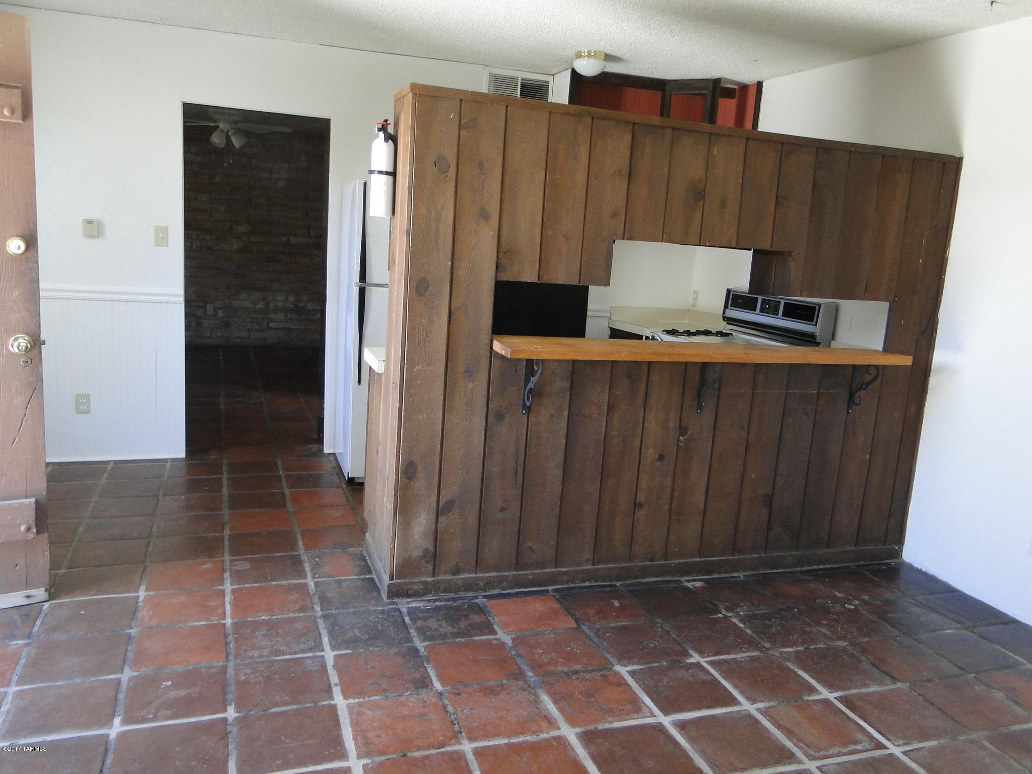 This central Tucson gem is now available!! Have you ever wanted to own a duplex? Live in one unit while renting the second for extra cash?? Or maybe buy as an investment & let the tenants make the mortgage payment for you?? Close to the U of A, shopping, restaurants and minutes from the freeway. This property features a 2bed/1bath unit with a garage and a second 1bed/1bath unit with a carport in the back. Both units are currently occupied & tenants pay their own gas & electric. The roofs are being re-coated in February 2017, and will convey with a 2 year warranty. **Please do not disturb tenants**