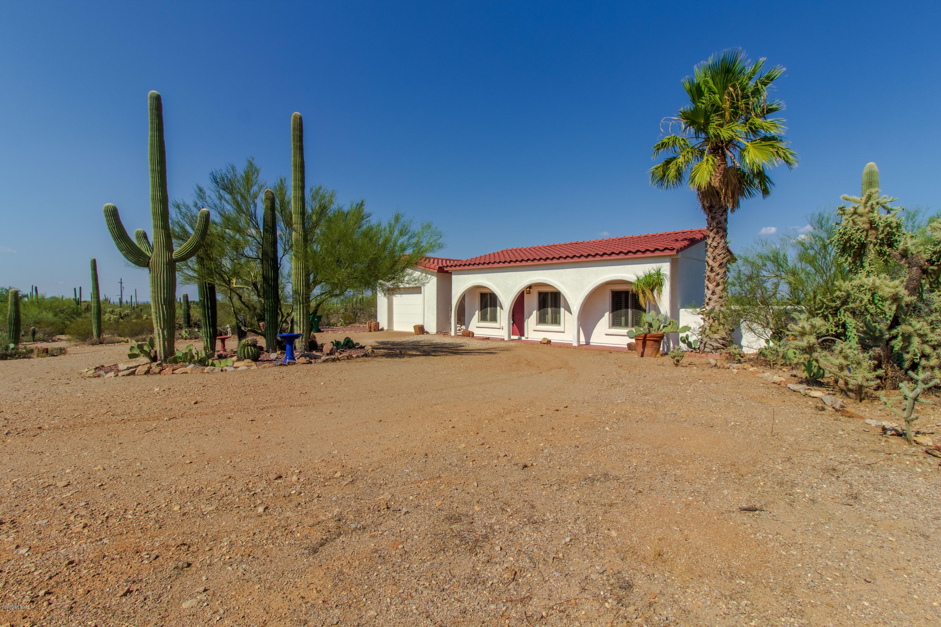 Directions : Take Ina to Wade, Left on Wade, Left down unmarked road, follow road all the way down, house located at the end of the driveway.

This is a cute and quaint back house located on large land with Mountain Views all around. Wrap around driveway with an over sized 1 car garage.  Living room with built in shelving and TV stand. Built in desk and lots of storage can be found in this home. Kitchen has mini fridge and table top microwave. Garage includes a full size refrigerator. Stacked washer and dryer included. Full master bathroom and large walk in master closet. Fully enclosed backyard with rock. $200 flat billback for water, septic, trash and electric.
Storage sheds not included. No landline available.
This one will leave you loving the desert! This home is available now. The rental rate is $1,050.00 per month and the security deposit is $1,150.00. If pets are allowed and approved, there is a $20.00 per pet monthly pet fee, plus the $150 per pet of additional deposit. 2 Pets under 30 lbs Ok.

Every adult age 18 and over must complete an application. The application fee is $55 per adult. The application process includes credit, criminal, previous rental history, employment and income verification.

Our minimum rental requirements include the following:
1.The applicants' household verifiable gross monthly income must be 3 times the rental rate. If you are concerned about insufficient income, you may be able to address this concern by adding a cosigner or offering additional security deposit. Contact us for details.
2.All our homes are offered as non-smoking. No smoking is allowed on the premises, inside or outside the home.
3.Reasonable credit. If you are concerned about challenged credit, you may be able to address this concern by adding a cosigner or offering additional security deposit. Contact us for details.
4.We do not accept Section 8.
5.Applicant to provide proof that debts to previous landlords have been satisfied. An eviction can be grounds for denial.
6.No felonies for the past 10 years related to property damage, illegal substance manufacturing or distribution, or assault. Other criminal activity may be grounds for denial.
7.All pets are subject to approval.
8.No bankruptcies that have not already been discharged.
9. All current or pending collection accounts owed to any utility companies must be paid in full, with no exception and must provide a receipt from the collection agency or utility company stating the collection fee has been paid or settled.
10. You must fill out an application on www.bluefoxproperties.com. Applications submitted through any other site will not be accepted and Blue Fox will not be responsible for any refunds.

Blue Fox Properties is an Equal Opportunity Housing provider. We are also licensed REALTORS.