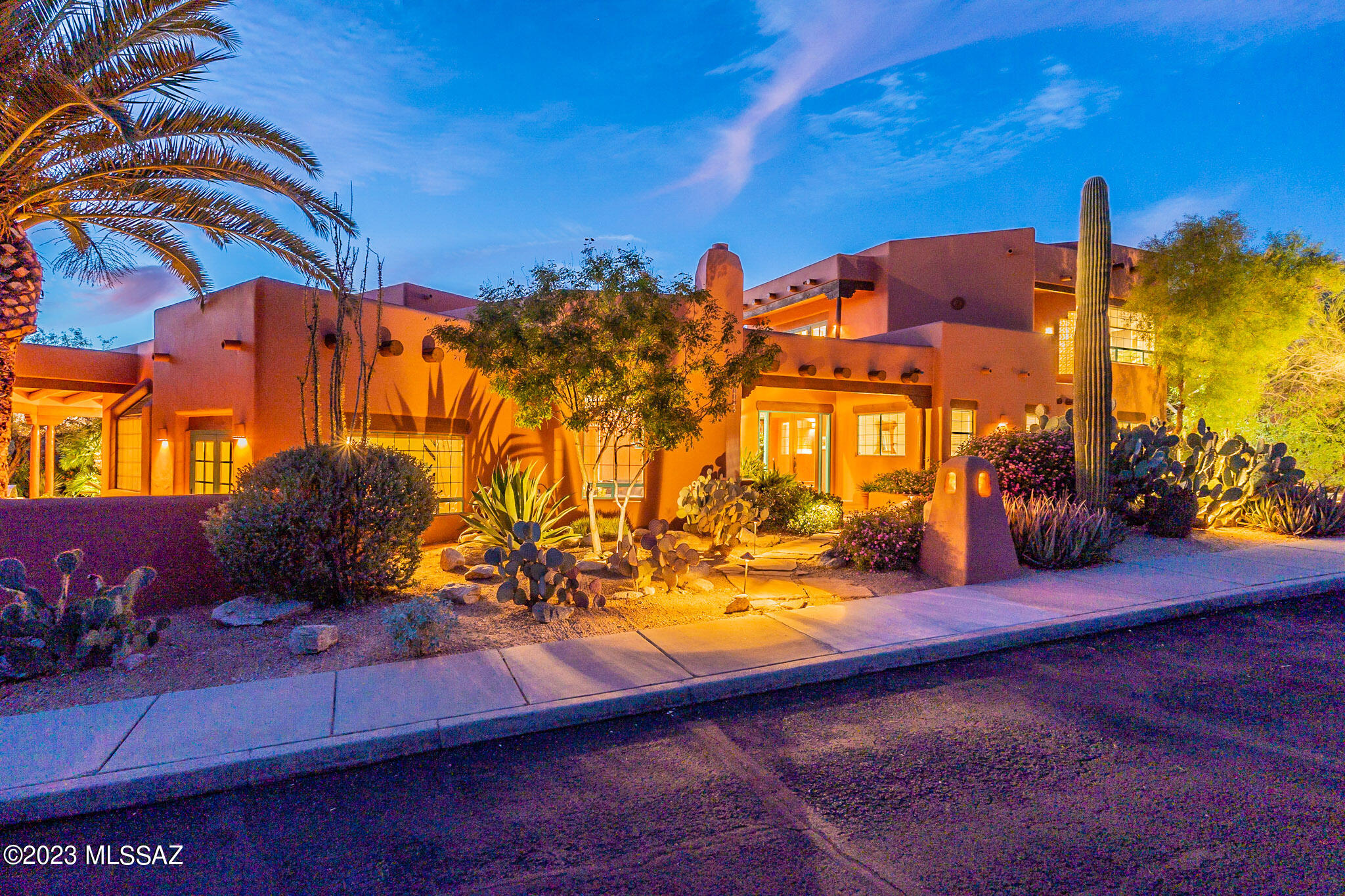 Classic 4BR & 4BA Santa Fe Home on The Golf Course in The Coveted Guard Gated Community of Ventana Canyon.Fine Features Include: Open Floor Plan w/High Ceilings,Abundant Natural Light Throughout,Entry Foyer w/ Wall of Windows Opening to Oasis Like Backyard,Formal Living & Dining Areas w/Beehive Fireplace,Family Room w/Beamed Ceilings,Fireplace & Full Wet Bar.Spacious Island Kitchen w/Garden Window,Stainless Appliances,Gas Range, & Eating Area.2nd Level Primary Suite w/Sitting Area,Fireplace,& Private Balcony w/Golf Course & Mountain Views.Two Downstairs Bedrooms w/Jack & Jill Spanish Tile Bathroom.Office/BR #4 Offers EnSuite Set Up w/Pool Access.Multiple Private Outdoor Living Spaces w/Lush Landscaping,Grass,Palm Trees,Covered Patios,Built In Grill,& Sparkling Pool & Spa.2 Car Garage.