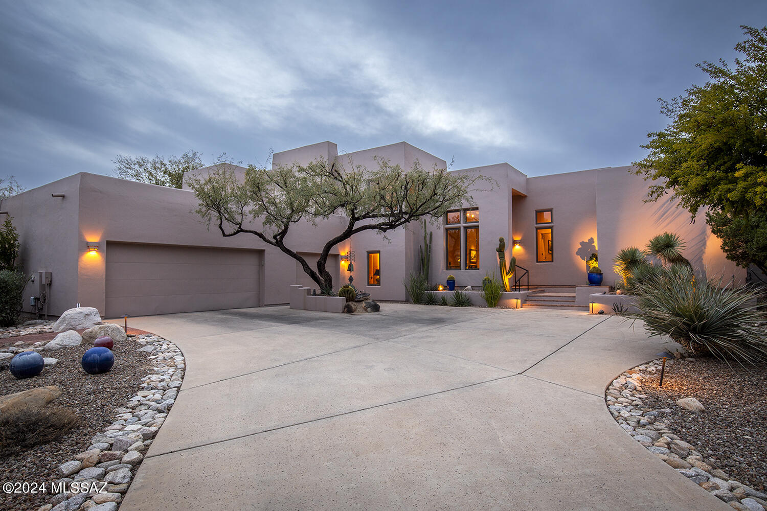 Located along the 9th fairway of the Canyon course, this Bryan Martinovich custom home blends elegant charm with modern day amenities. All new Marvin windows & doors! Be wowed by the gorgeous brick floors. The main level offers an easy flow between multiple fireplaced entertaining areas & spacious chef's kitchen with island & walk-in pantry. Outside, the resort style backyard offers pool & spa, more gathering options, additional fireplace, built-in BBQ, & views of the course & mountains. Primary bedroom with sitting area, large closet & luxury bath, 2nd bedroom & bath & laundry room complete the main level. Upstairs, you'll find a loft & 2 additional bedrooms sharing a jack-&-jill bath with separate vanities. The spacious 3-car garage with epoxied floors has built-ins & extensive storage.