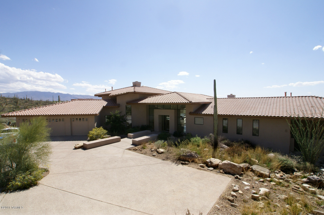 STUNNING CONTEMPORARY DESIGNED & BUILT BY JOHN CAMPISANO. SOARING CEILINGS & LOTS OF GLASS PROVIDE EXPANSIVE VIEWS OF THE CITY LIGHTS & MOUNTAIN PEAKS. SITUATED ON LARGE 3.5 ACRE LOT W/PLENTY OF OPEN SPACE BETWEEN OTHER HOMES. PRIVATE ENCLAVE OF LARGE LOTS ACROSS FROM CORONADO NATL FOREST. LARGE MEDIA ROOM. STAIRS LEAD TO LOFT W/TWO BR'S AND BATHS. GREAT VALUE FOR QUALITY CONSTRUCTION. MANAGER OF THE SELLING ENTITY IS THE LA.