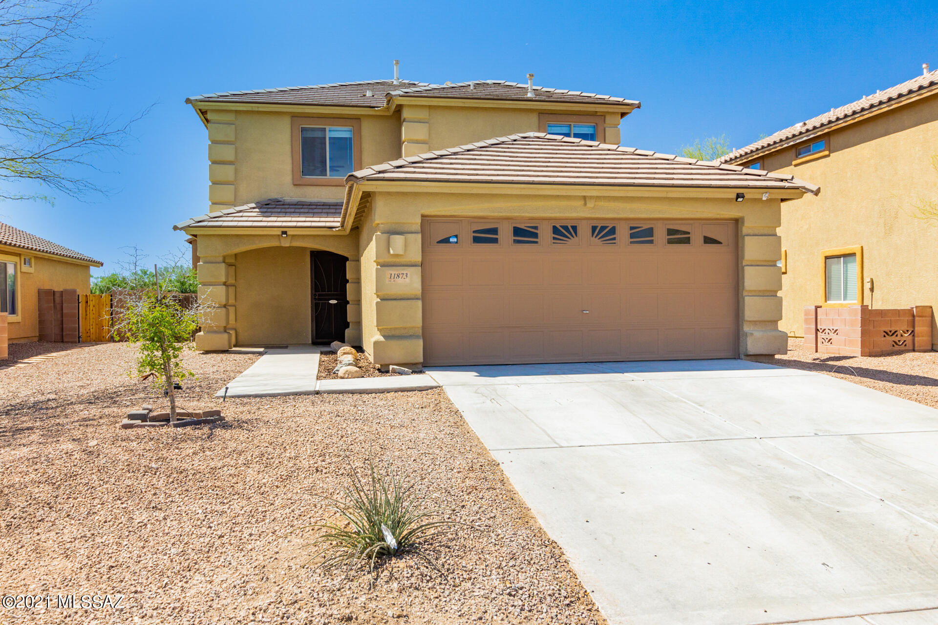 Great curb appeal home w/a picturesque backyard setting! Extended covered patio, paver patio, fenced lush green landscape area, & shade tree. Perfect for outdoor entertaining.  French doors to patio from the dining area, neutral tile floor, soothing palette, ceiling fans, & window blinds. Stylish kitchen counters, SS appliances, pantry, & plenty of wood cabinets. Master retreat on the first level w/a beautiful wood ''look'' tile floor & private en suite. Spacious loft area, plush carpet, ample closets, updated baths, & an interior laundry closet. This wonderful home will not disappoint!