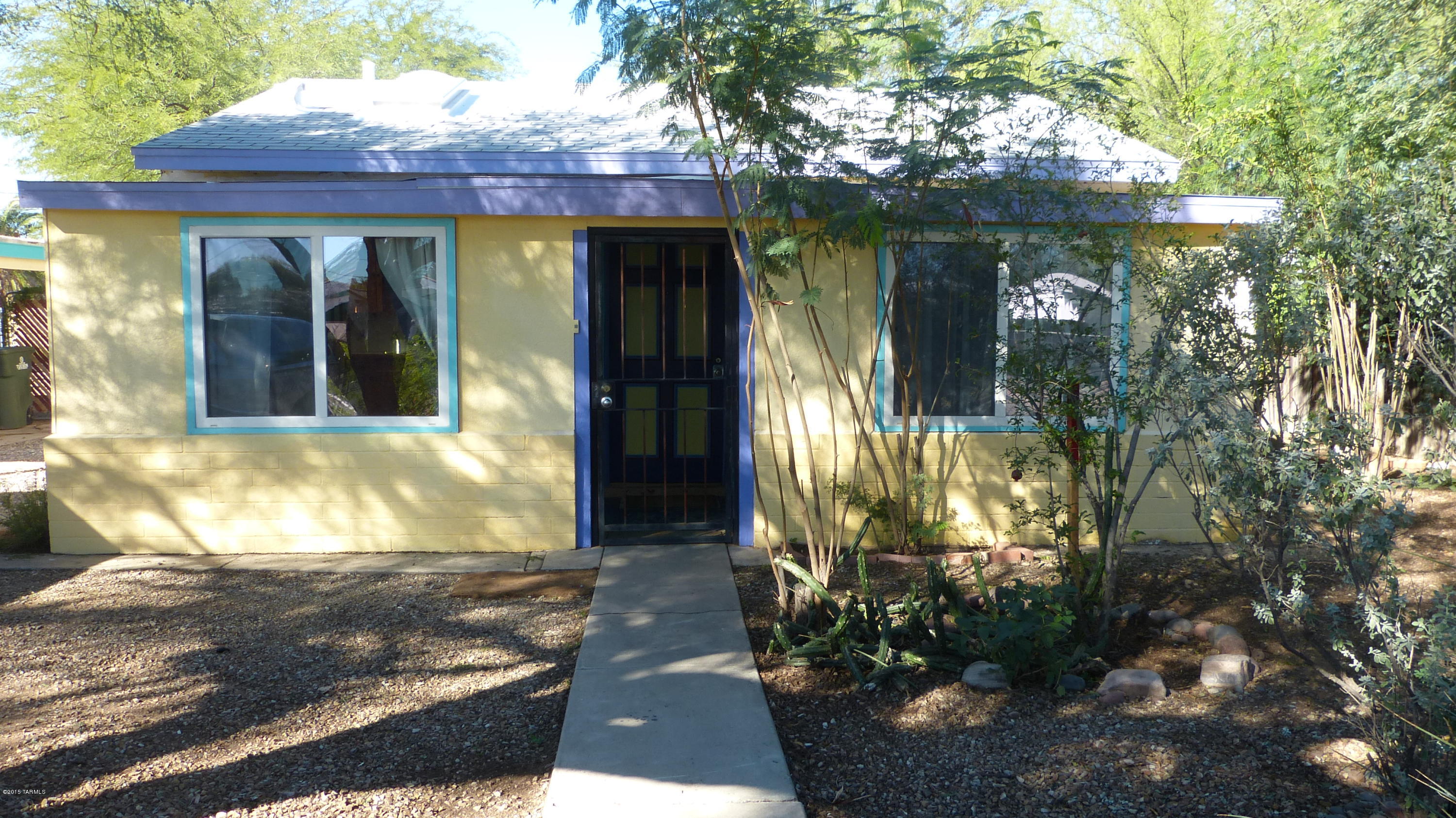 YOU WILL FALL IN LOVE WITH THIS ADORABLE SOUTHWEST CHARMER SET AMONGST TALL SHADY TREES, POMEGRANITE & GRAPEFRUIT. SALTILLIO TILE THRUOUT, CUSTOM CABINETRY, BREAKFAST NOOK, BONUS OFFICE AREA OFF LIVING ROOM, 2 GOOD SIZE BEDROOMS, 2 FULL BATH WITH CUSTOM SINKS, FAN IN EACH ROOM, ALL APPLIANCES, SKYLIGHTS, UPGRADED ELECTRIC AND LAST BUT NOT LEAST AIR CONDITIONING. THIS HOME IS JUST LOADED WITH CUTE AND COZY!! LARGE LOT, ROOF JUST RECENTLY CHECKED AND MAINTAINED, GREAT NEIGHBORHOOD CLOSE TO RANDOLPH PARK, SHOPPING , RESTAURANTS ETC. EVERYTHING READY AND WAITING FOR NEW OWNER. BETTER HURRY THIS IS A HOME TO BE CHERISHED AND BOUND TO BE SNAPPED UP QUICKLY.